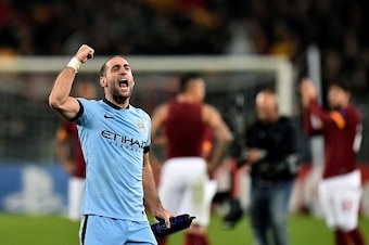 Manchester City's Argentinian defender Pablo Zabaleta celebrates after scoring during the UEFA Champions League football match AS Roma vs Manchester City on December 10, 2014 at the Olympic stadium in Rome.       AFP PHOTO / GABRIEL BOUYS        (Photo cr