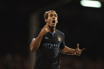 LONDON, ENGLAND - NOVEMBER 21:  Pablo Zabaleta of Manchester City celebrates scoring his teams second goal during the Barclays Premier League match between Fulham and Manchester City at Craven Cottage on November 21, 2010 in London, England.  (Photo by Sc