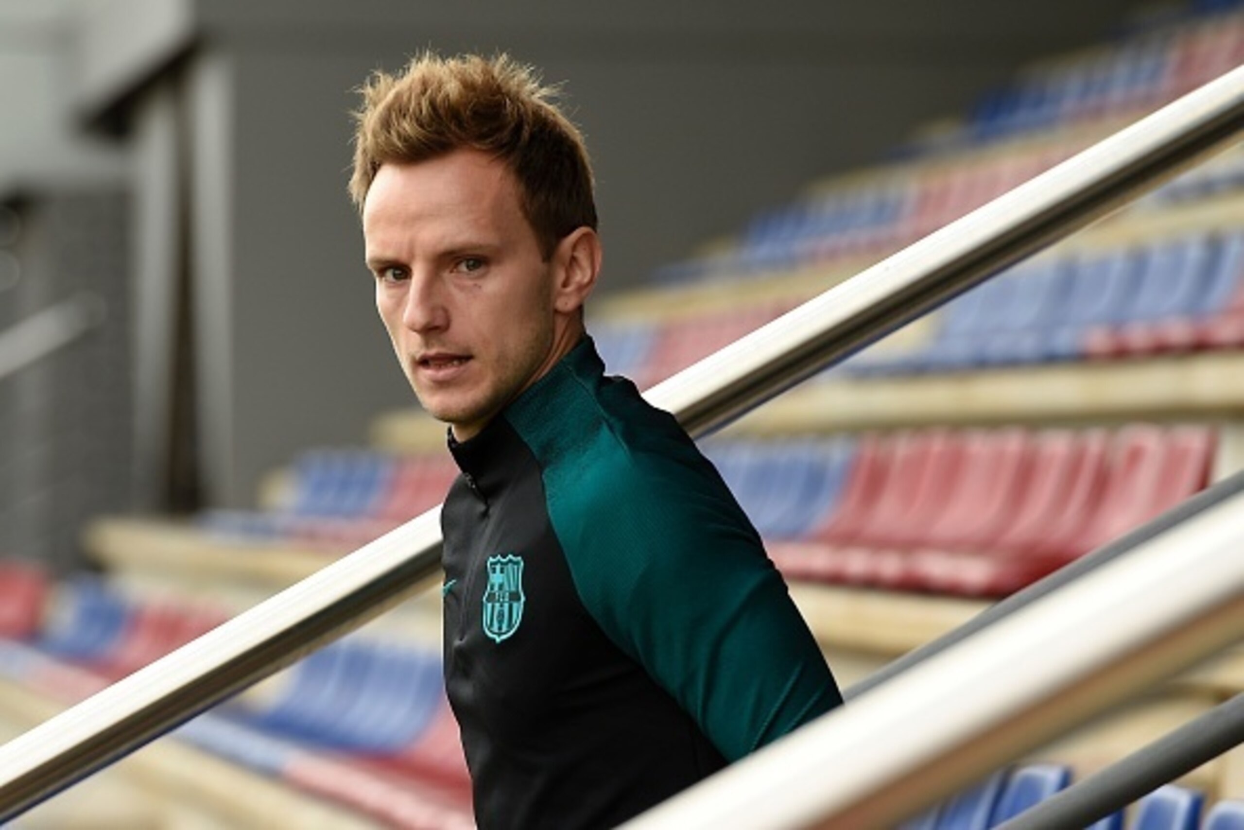 Barcelona's Croatian midfielder Ivan Rakitic arrives for a training session at the Sports Center FC Barcelona Joan Gamper in Sant Joan Despi, near Barcelona on December 5, 2016, on the eve of the UEFA Champions League football match FC vs Borussia Moenche