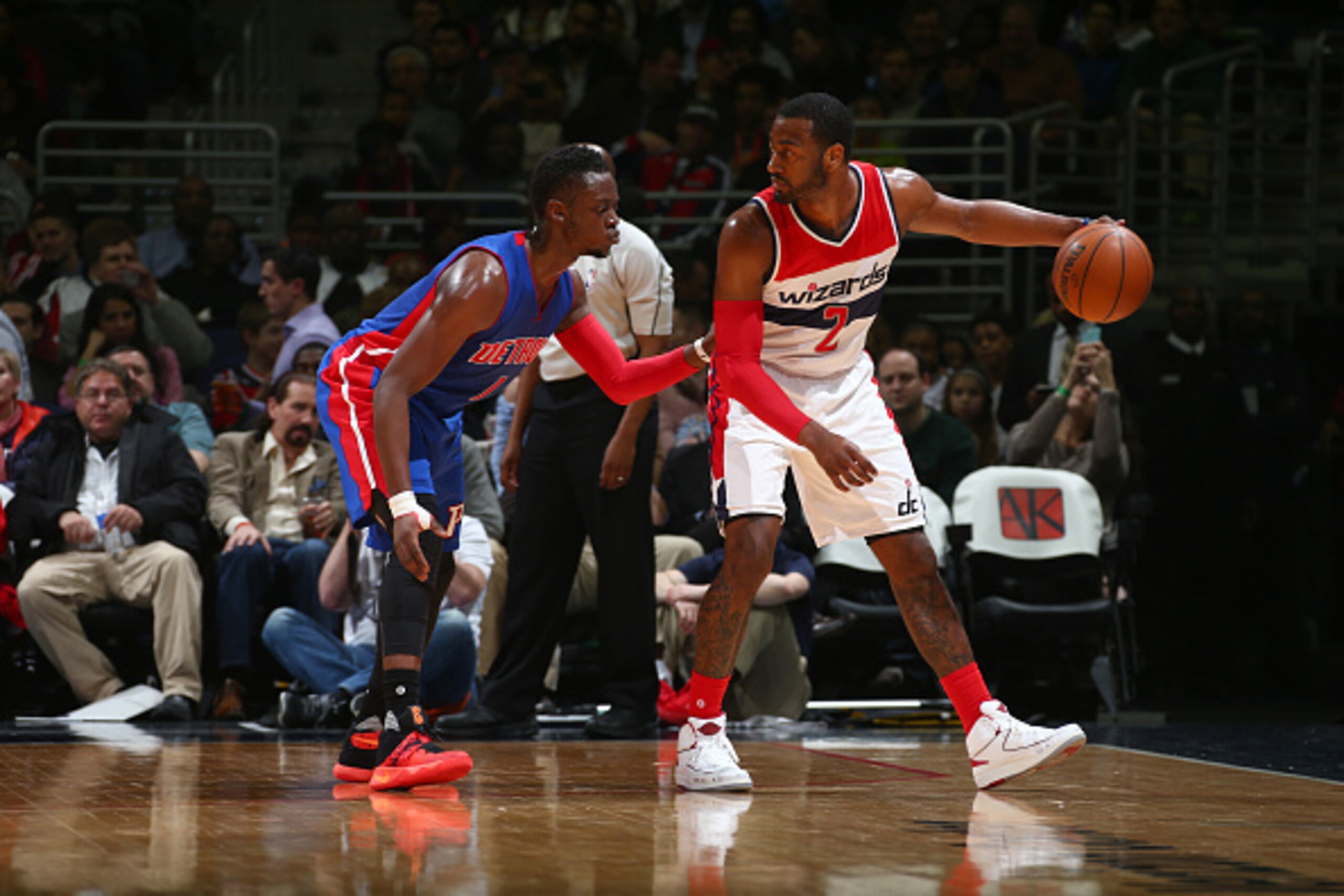 WASHINGTON, DC - FEBRUARY 19:  John Wall #2 of the Washington Wizards handles the ball against Reggie Jackson #1 of the Detroit Pistons on February 19, 2016 at Verizon Center in Washington, DC. NOTE TO USER: User expressly acknowledges and agrees that, by