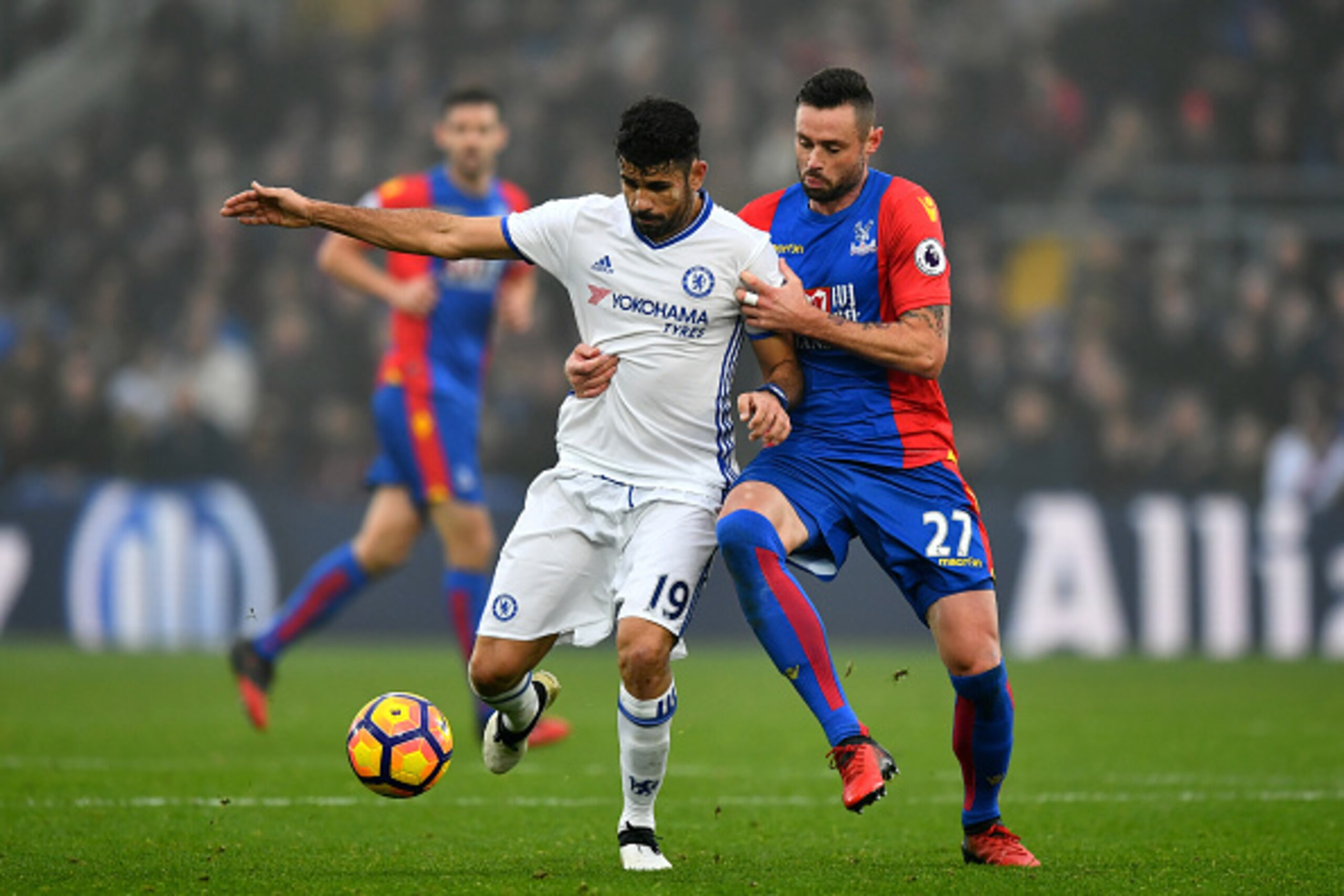 LONDON, ENGLAND - DECEMBER 17: Diego Costa of Chelsea (L) is held by Jordon Mutch of Crystal Palace (R) during the Premier League match between Crystal Palace and Chelsea at Selhurst Park on December 17, 2016 in London, England. (Photo by Dan Mullan/Get LONDON, ENGLAND - DECEMBER 17: Diego Costa of Chelsea (L) is held by Jordon Mutch of Crystal Palace (R) during the Premier League match between Crystal Palace and Chelsea at Selhurst Park on December 17, 2016 in London, England. (Photo by Dan Mullan/Get