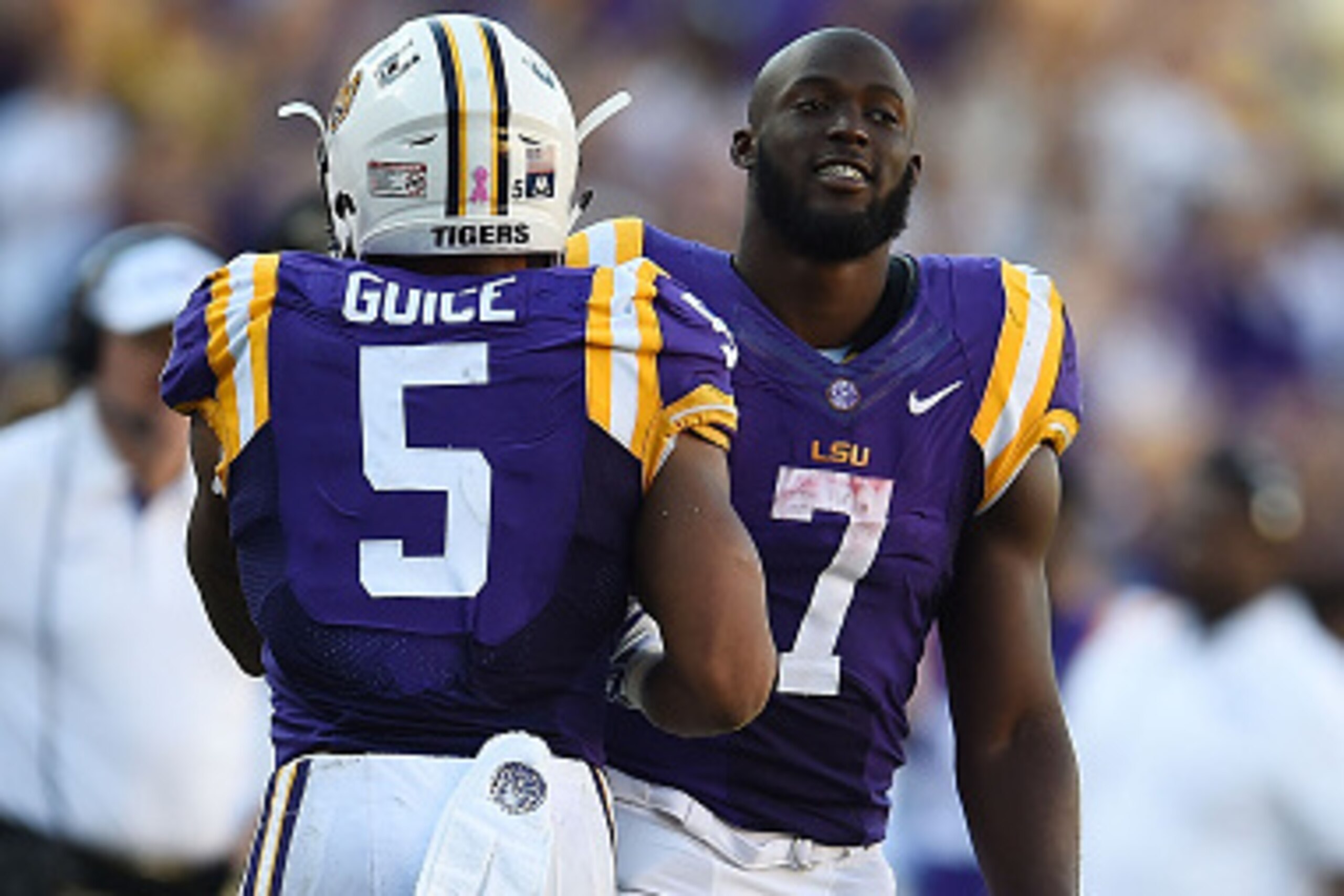 BATON ROUGE, LA - OCTOBER 10:  Derrius Guice #5 is congratulated by Leonard Fournette #7 of the LSU Tigers following a touchdown against the South Carolina Gamecocks at Tiger Stadium on October 10, 2015 in Baton Rouge, Louisiana.  LSU defeated South Carol