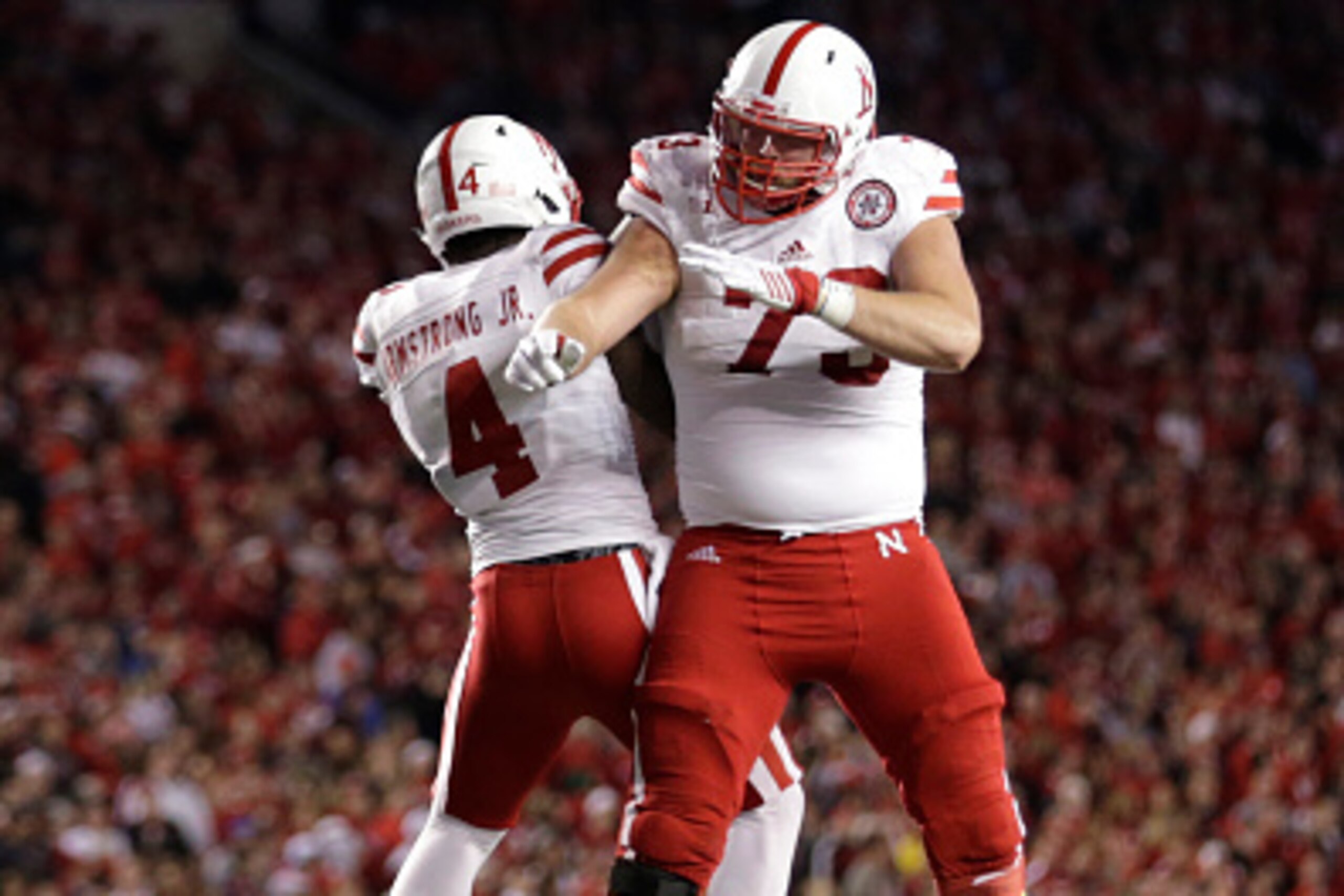 MADISON, WI - OCTOBER 29: Tommy Armstrong Jr. #4 of the Nebraska Cornhuskers celebrates after scoring a touchdown during the fourth quarter against the Wisconsin Badgers at Camp Randall Stadium on October 29, 2016 in Madison, Wisconsin. (Photo by Mike McG