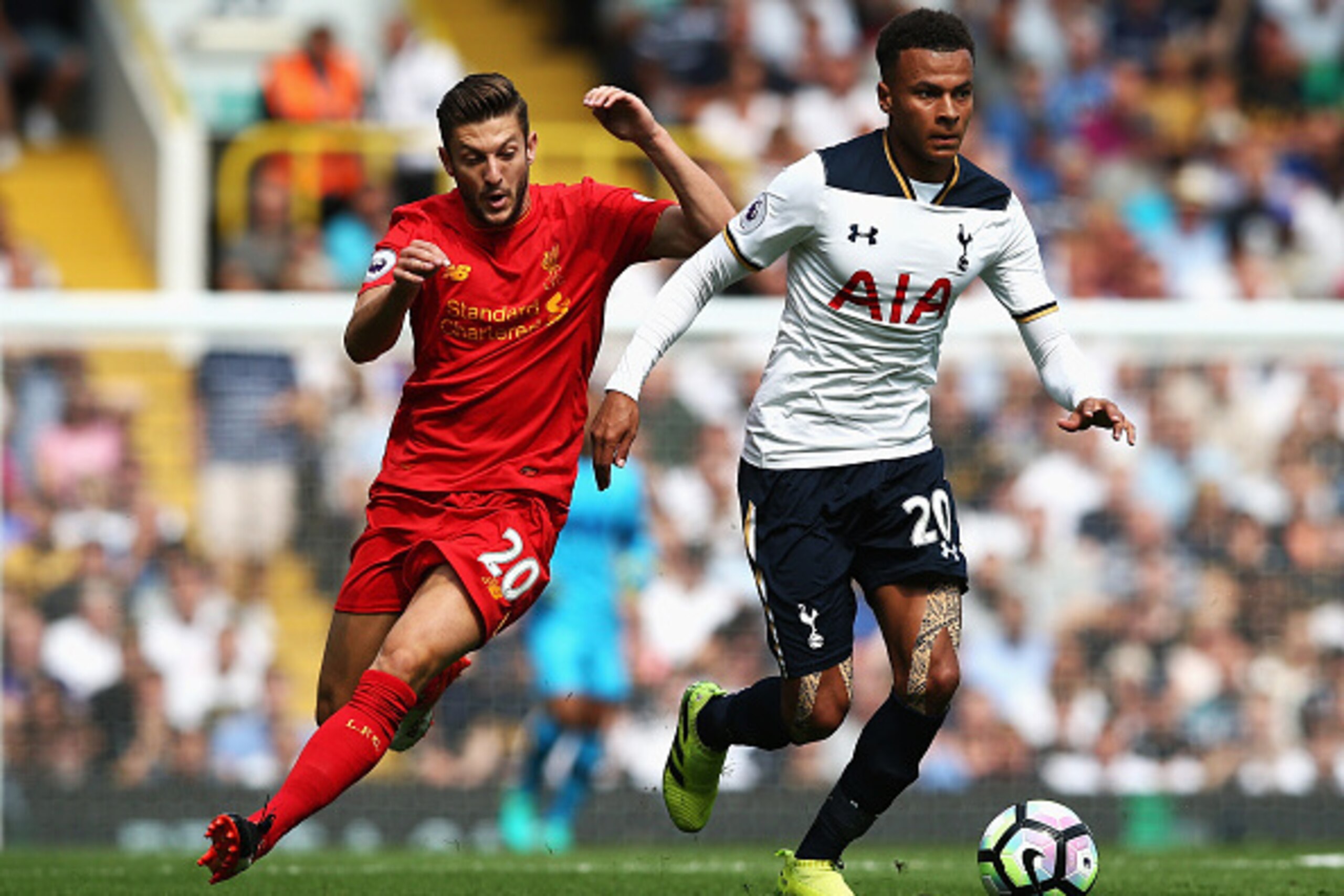 LONDON, ENGLAND - AUGUST 27: Dele Alli of Tottenham Hotspur is chased down by Adam Lallana of Liverpool during the Premier League match between Tottenham Hotspur and Liverpool at White Hart Lane on August 27, 2016 in London, England.  (Photo by Jan Kruger