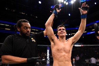 SACRAMENTO, CA - DECEMBER 17:  Mickey Gall celebrates after his submission victory over Sage Northcutt in their welterweight bout during the UFC Fight Night event inside the Golden 1 Center Arena on December 17, 2016 in Sacramento, California. (Photo by J
