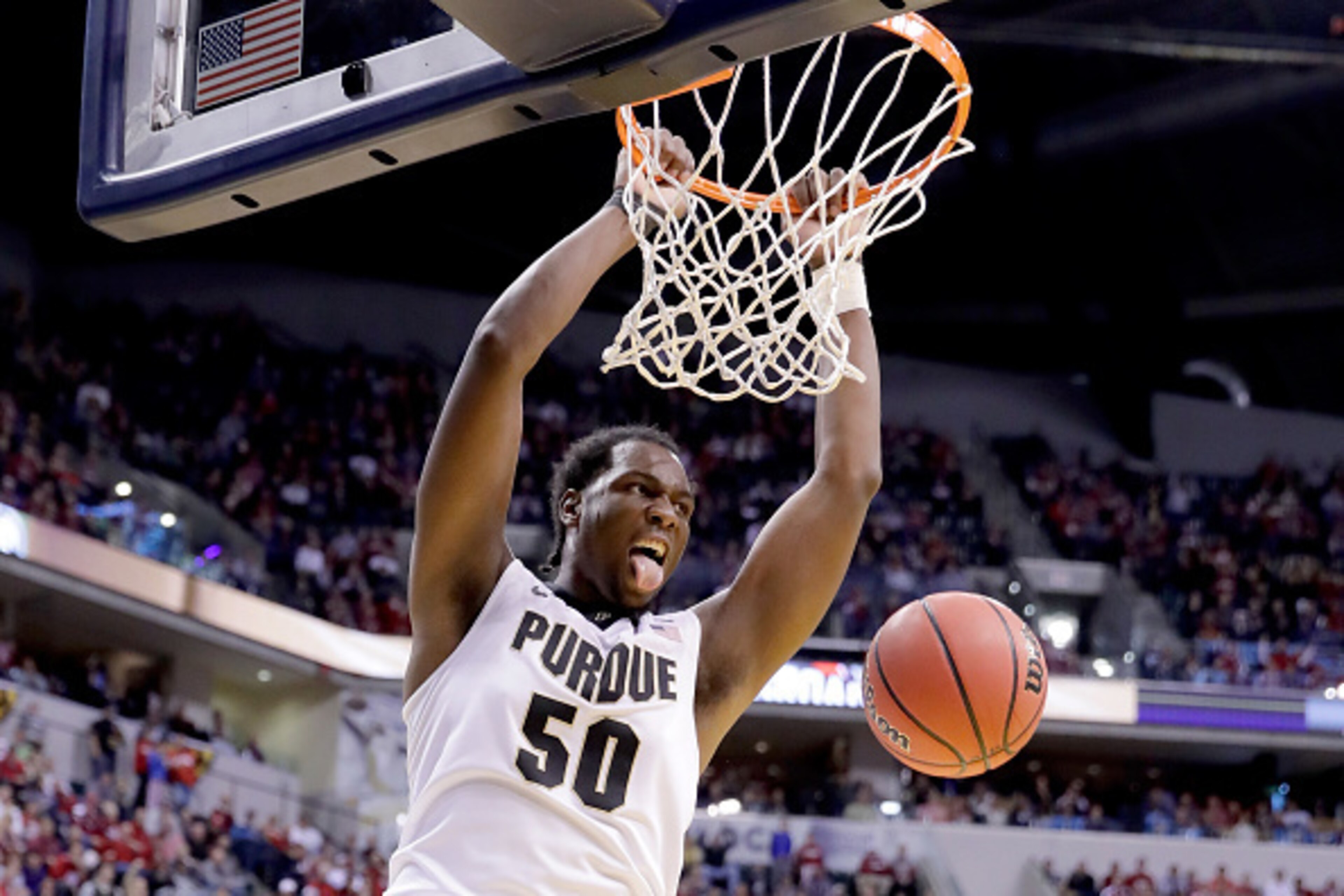 INDIANAPOLIS, IN - DECEMBER 17:  Caleb Swanigan #50 of the Purdue Boilermakers dunks the ball during the game against the Notre Dame Fighting Irish during the Crossroads Classic at Bankers Life Fieldhouse on December 17, 2016 in Indianapolis, Indiana.  (P
