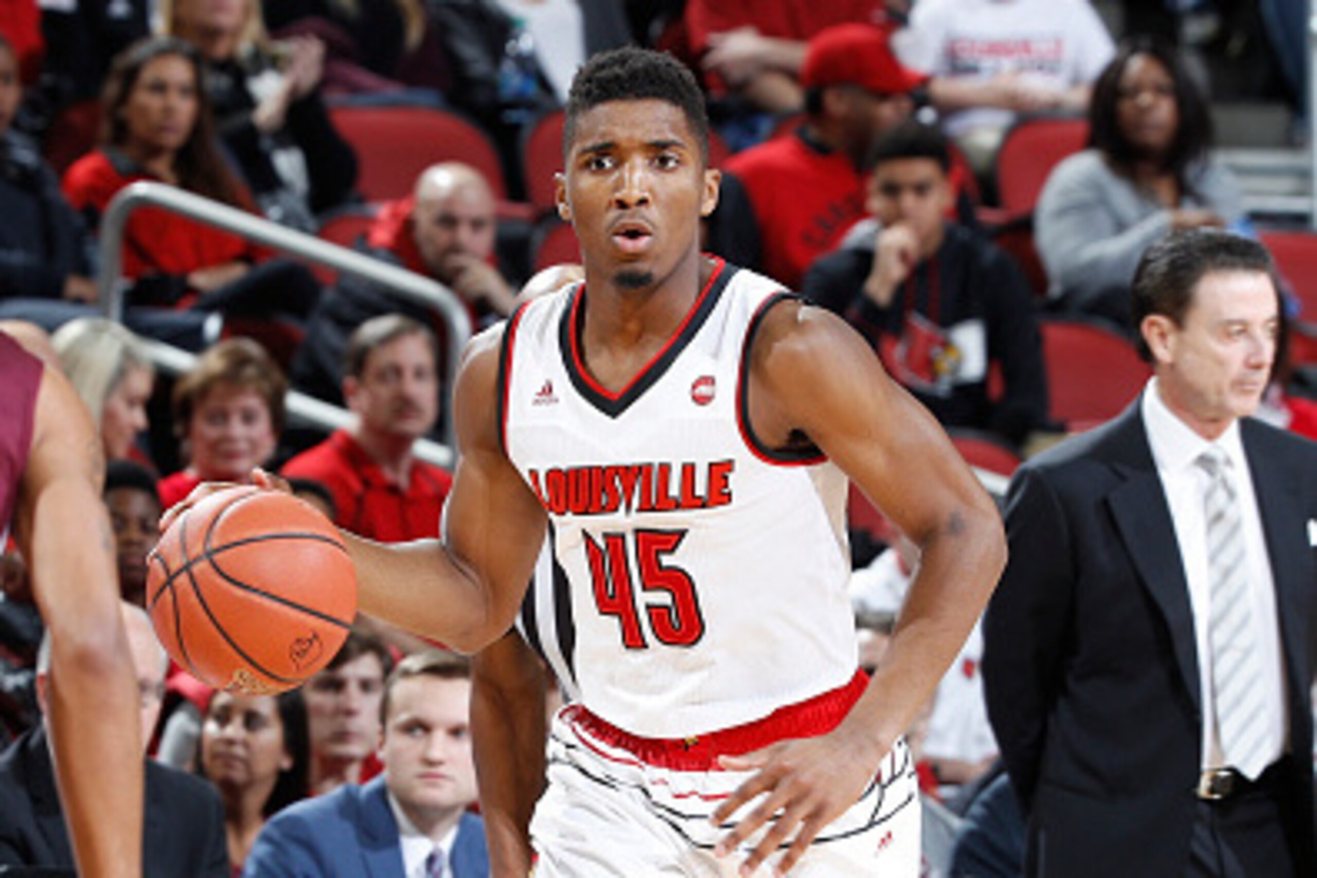 LOUISVILLE, KY - DECEMBER 07: Donovan Mitchell #45 of the Louisville Cardinals brings the ball up court against the Southern Illinois Salukis during the game at KFC YUM! Center on December 7, 2016 in Louisville, Kentucky. Louisville defeated Southern Illi