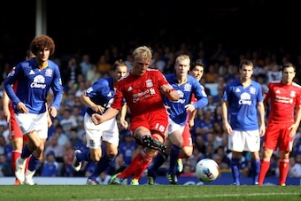LIVERPOOL, ENGLAND - OCTOBER 01:  Dirk Kuyt of Liverpool takes and subsequently misses a penalty kick during the Barclays Premier League match between Everton and Liverpool at Goodison Park on October 1, 2011 in Liverpool, England.  (Photo by Clive Brunsk