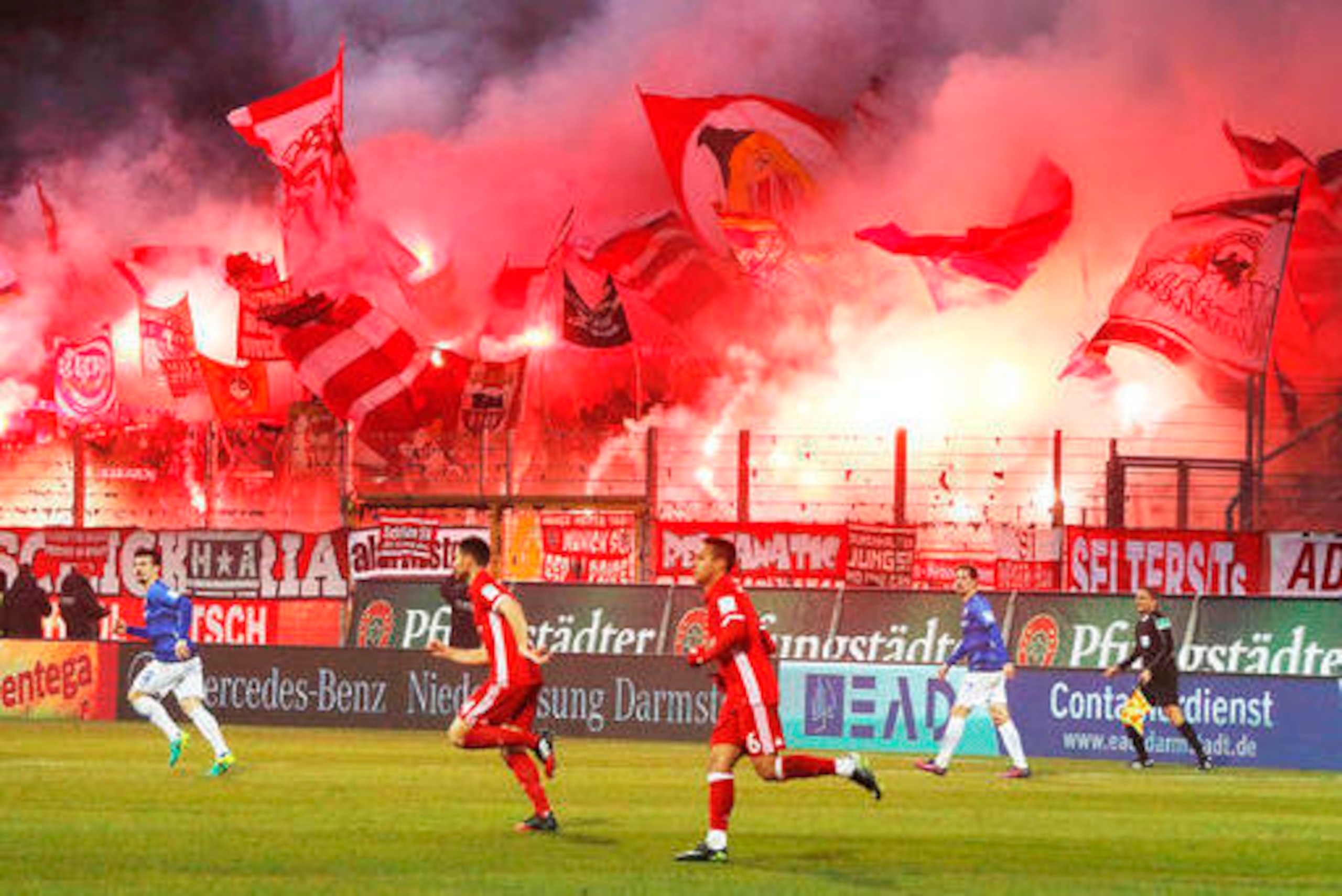 It was the Bayern fans with the flare, not the team, in Darmstadt.