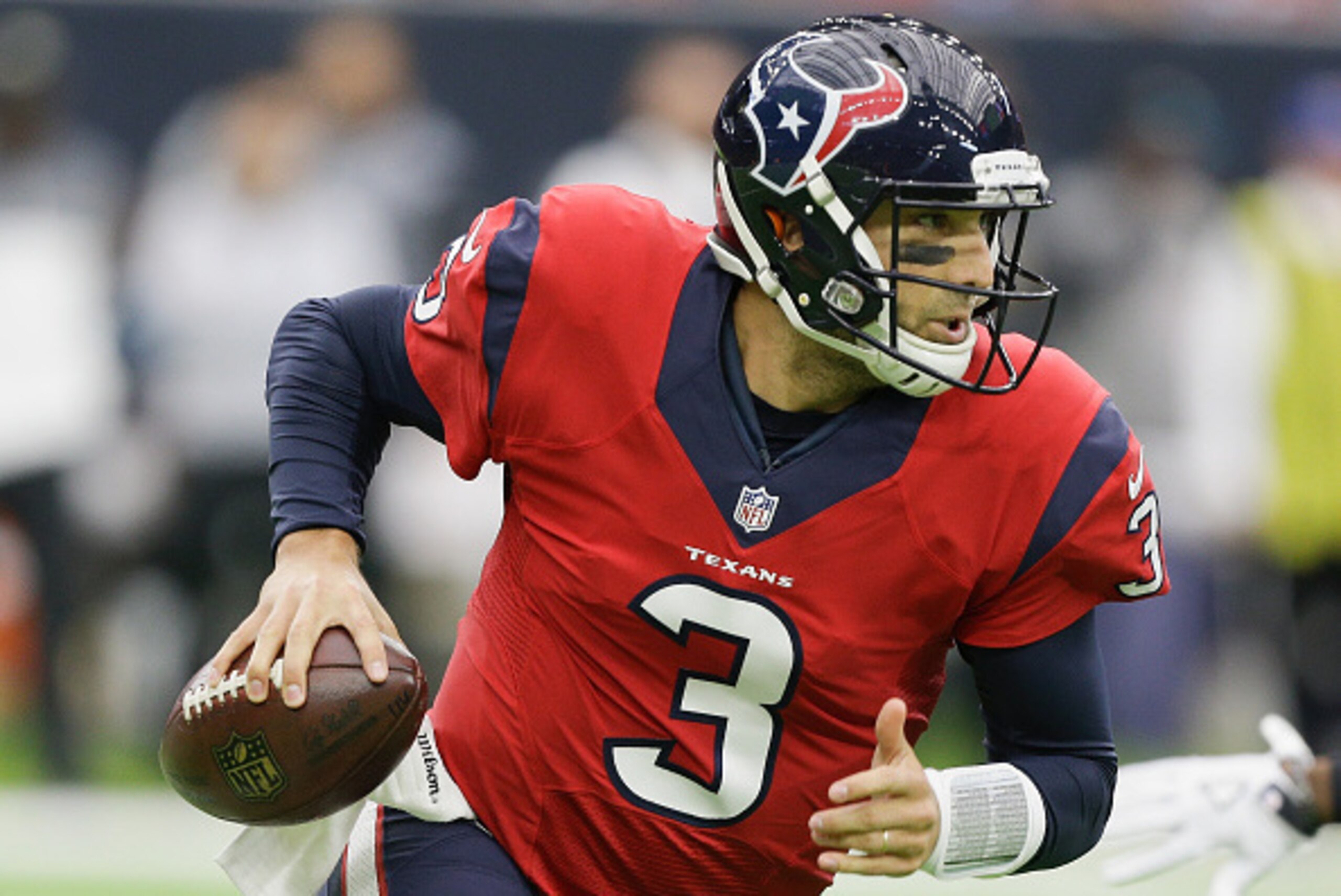 HOUSTON, TX - DECEMBER 18:  Tom Savage #3 of the Houston Texans scrambles out of the pocket as he looks for a receiver in the second quarter against the Jacksonville Jaguars at NRG Stadium on December 18, 2016 in Houston, Texas.  (Photo by Bob Levey/Getty
