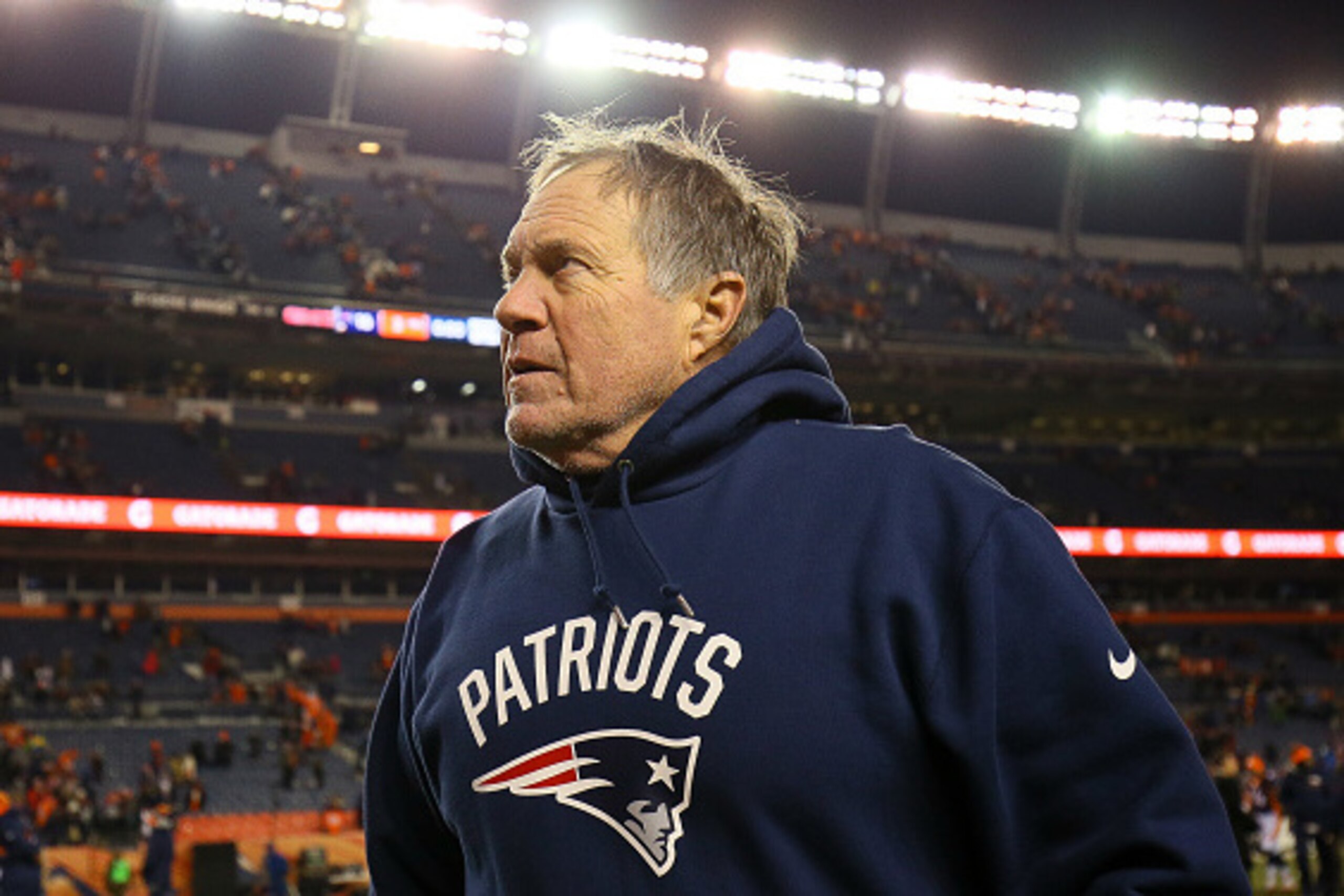 DENVER, CO - DECEMBER 18:  Head coach Bill Belichick of the New England Patriots walks off the field after a 16-3 win over the Denver Broncos at Sports Authority Field at Mile High on December 18, 2016 in Denver, Colorado. (Photo by Justin Edmonds/Getty I