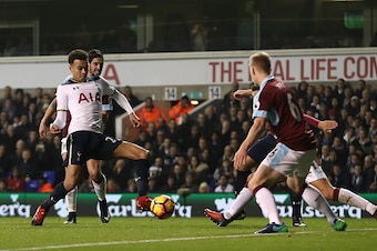 LONDON, ENGLAND - DECEMBER 18:  Dele Alli of Tottenham Hotspur (L) scores his sides first goal during the Premier League match between Tottenham Hotspur and Burnley at White Hart Lane on December 18, 2016 in London, England.  (Photo by Julian Finney/Getty