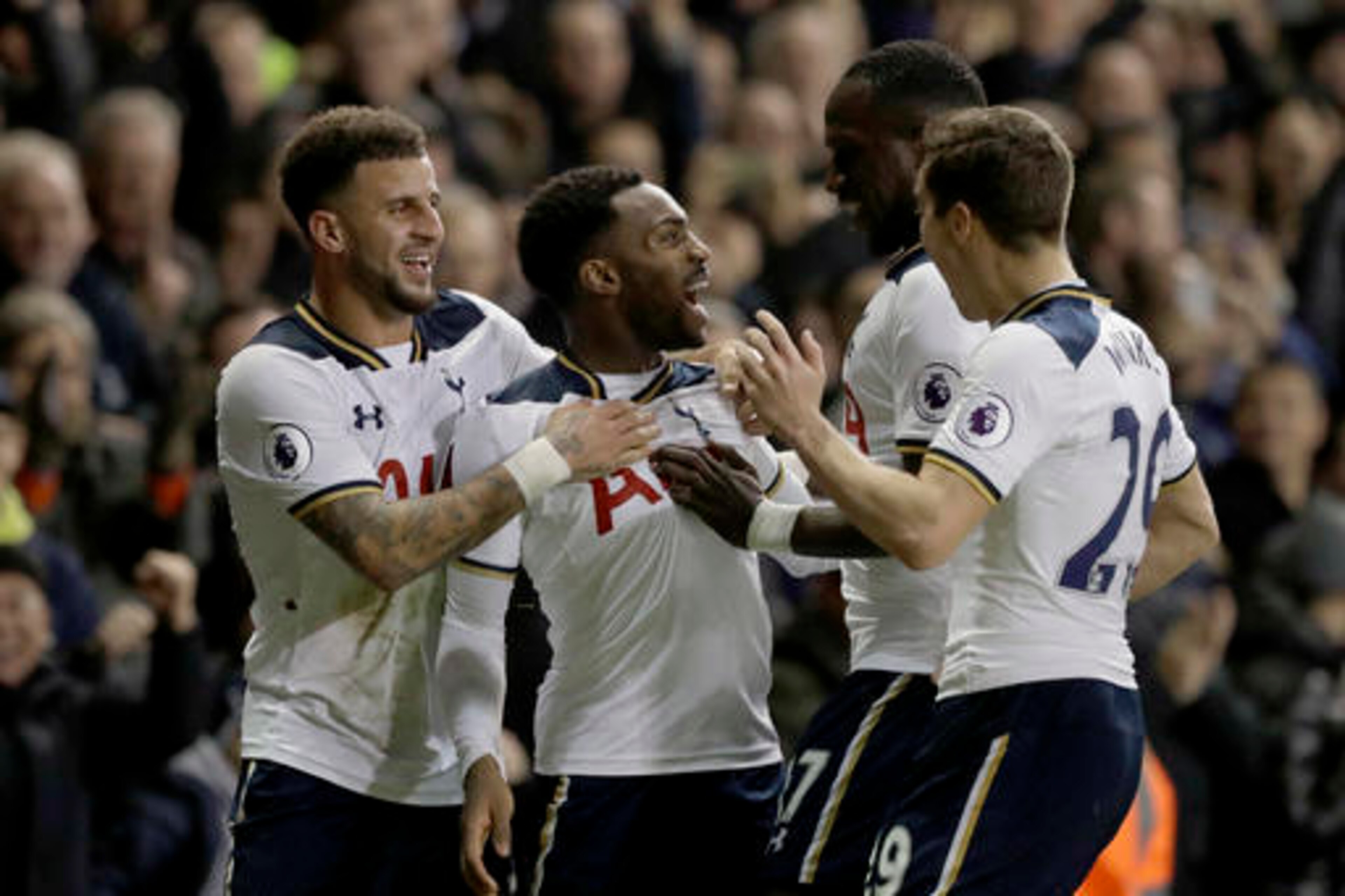 Harry Winks congratulating Rose on his winner, grateful after his earlier mistake led to Burnley's goal.