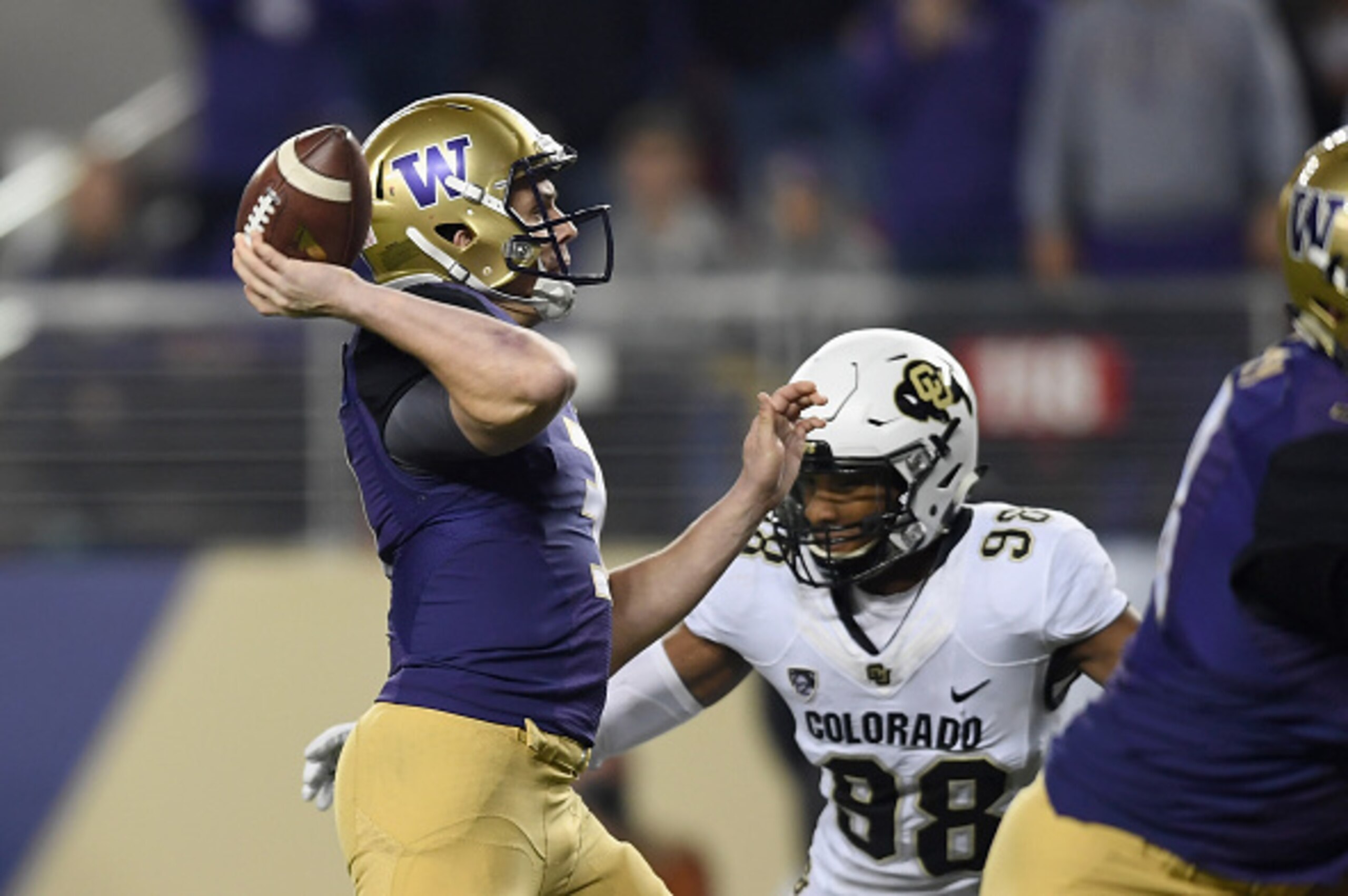 SANTA CLARA, CA - DECEMBER 02: Jake Browning #3 of the Washington Huskies passes the ball while being pressured by Jimmie Gilbert #98 of the Colorado Buffaloes during the Pac-12 Championship game at Levi's Stadium on December 2, 2016 in Santa Clara, Cali SANTA CLARA, CA - DECEMBER 02: Jake Browning #3 of the Washington Huskies passes the ball while being pressured by Jimmie Gilbert #98 of the Colorado Buffaloes during the Pac-12 Championship game at Levi's Stadium on December 2, 2016 in Santa Clara, Cali
