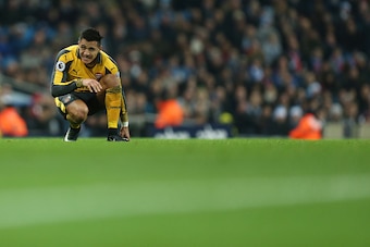 MANCHESTER, ENGLAND - DECEMBER 18: Alexis Sanchez of Arsenal suffers an injury during the Premier League match between Manchester City and Arsenal at Etihad Stadium on December 18, 2016 in Manchester, England. (Photo by James Baylis - AMA/Getty Images)