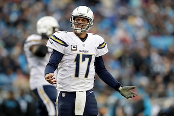 CHARLOTTE, NC - DECEMBER 11:   Philip Rivers #17 of the San Diego Chargers reacts after a play against the Carolina Panthers in the 4th quarter during their game at Bank of America Stadium on December 11, 2016 in Charlotte, North Carolina.  (Photo by Stre