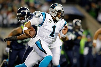 SEATTLE, WA - DECEMBER 04:  Quarterback Cam Newton #1 of the Carolina Panthers against the Seattle Seahawks at CenturyLink Field on December 4, 2016 in Seattle, Washington.  (Photo by Jonathan Ferrey/Getty Images)