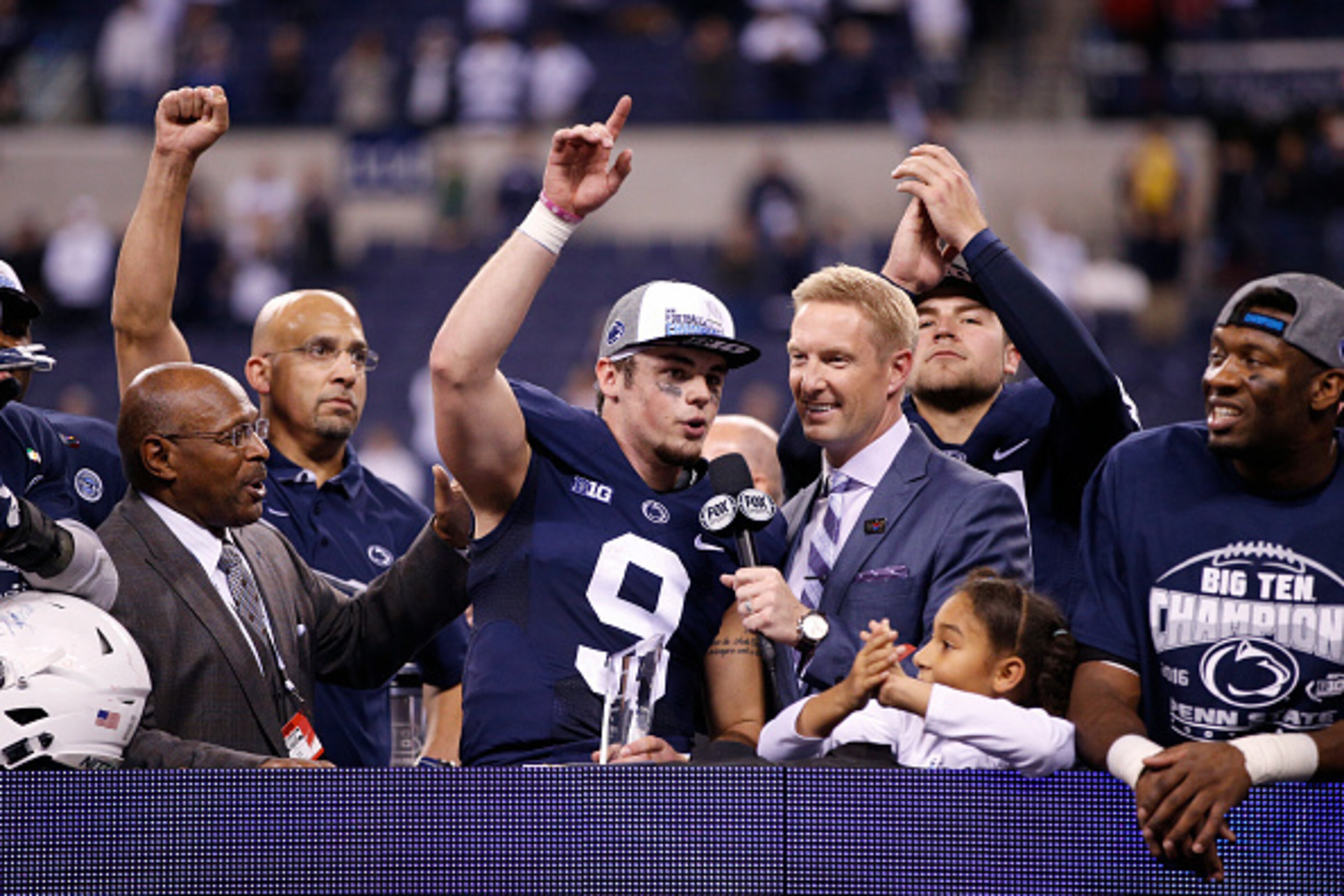 INDIANAPOLIS, IN - DECEMBER 03: Trace McSorley #9 of the Penn State Nittany Lions reacts while being interviewed by FOX Sports analyst Joel Klatt following the Big Ten Championship game against the Wisconsin Badgers at Lucas Oil Stadium on December 3, 201