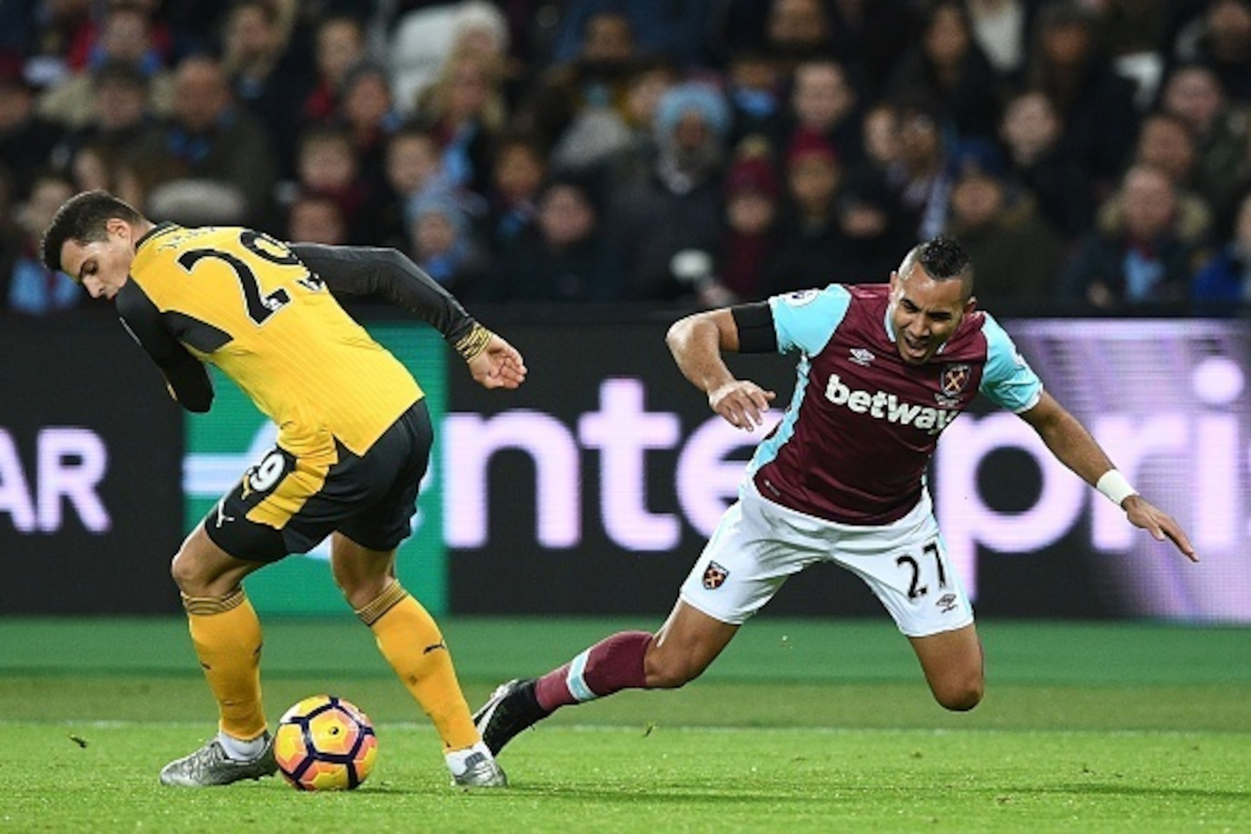 Arsenal's Swiss midfielder Granit Xhaka (L) vies with West Ham United's French midfielder Dimitri Payet during the English Premier League football match between West Ham United and Arsenal at The London Stadium, in east London on December 3, 2016. / AFP / Arsenal's Swiss midfielder Granit Xhaka (L) vies with West Ham United's French midfielder Dimitri Payet during the English Premier League football match between West Ham United and Arsenal at The London Stadium, in east London on December 3, 2016. / AFP /