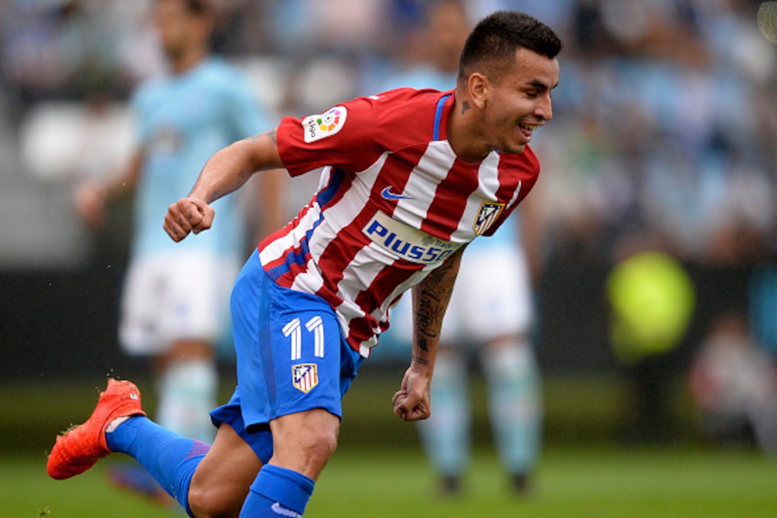 Atletico Madrid's Argentinian midfielder Angel Correa celebrates after scoring during the Spanish league football match RC Celta de Vigo vs Club Atletico de Madrid at the Balaidos stadium in Vigo on September 10, 2016.
Atletico won 4-0. / AFP / MIGUEL RIO Atletico Madrid's Argentinian midfielder Angel Correa celebrates after scoring during the Spanish league football match RC Celta de Vigo vs Club Atletico de Madrid at the Balaidos stadium in Vigo on September 10, 2016.
Atletico won 4-0. / AFP / MIGUEL RIO