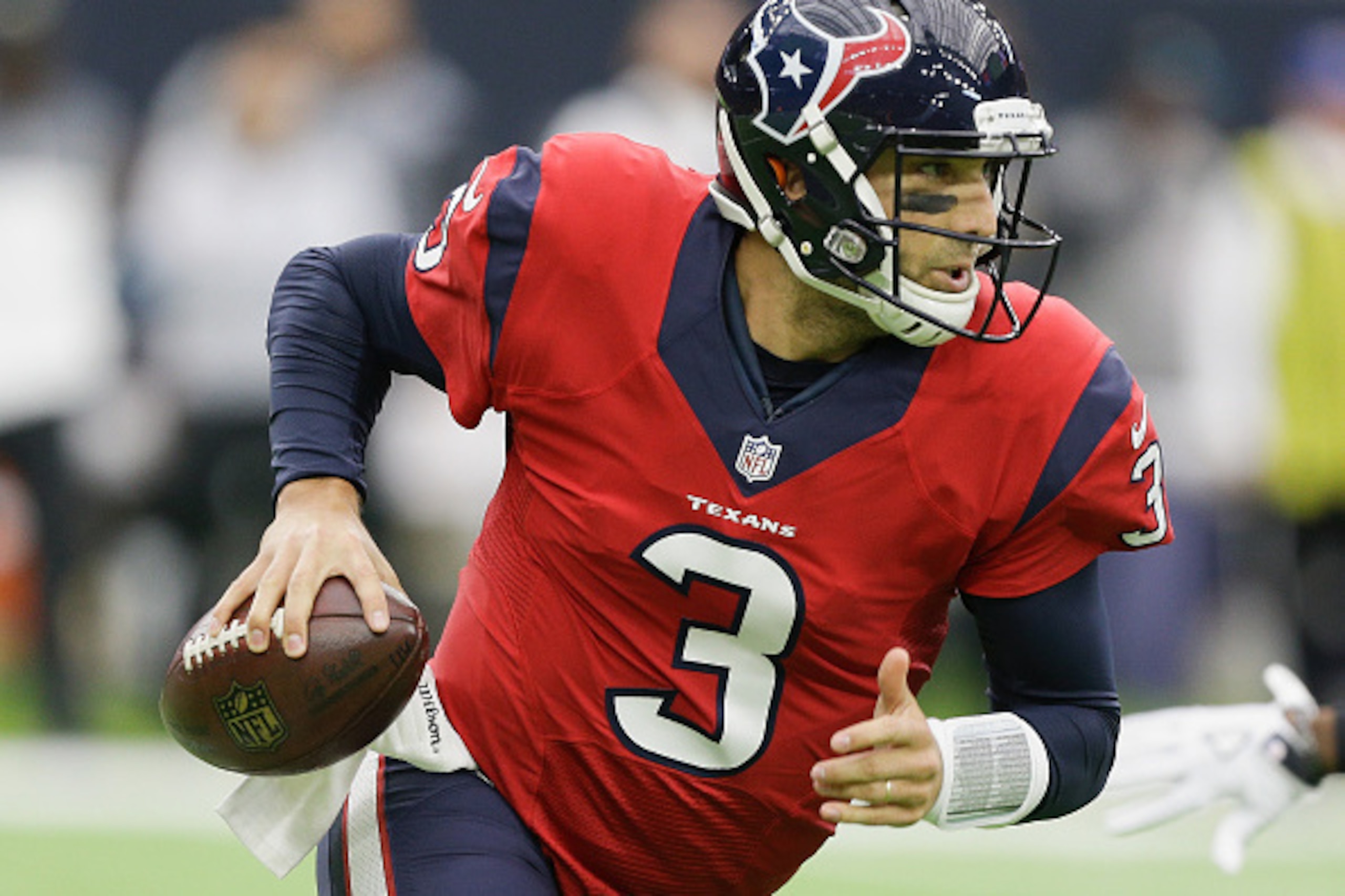 HOUSTON, TX - DECEMBER 18:  Tom Savage #3 of the Houston Texans scrambles out of the pocket as he looks for a receiver in the second quarter against the Jacksonville Jaguars at NRG Stadium on December 18, 2016 in Houston, Texas.  (Photo by Bob Levey/Getty
