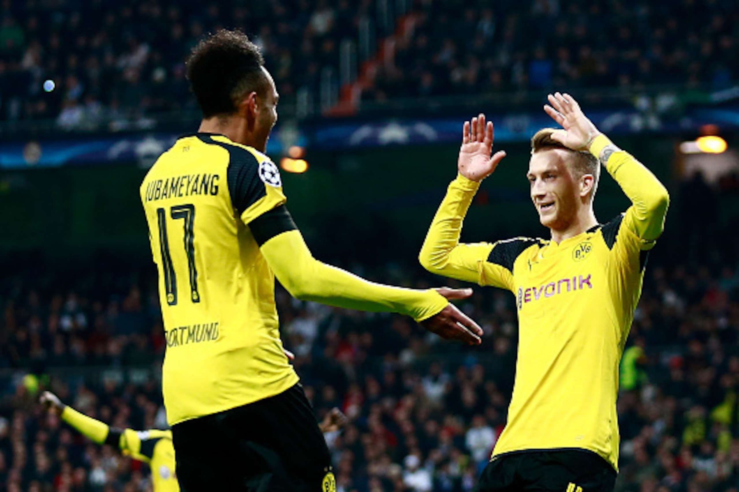 MADRID, SPAIN - DECEMBER 07:  Marco Reus of Borussia Dortmund (R) celebrates scoring his sides second goal with Pierre-Emerick Aubameyang of Borussia Dortmund (L) during the UEFA Champions League Group F match between Real Madrid CF and Borussia Dortmund 