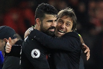 Chelsea's Italian head coach Antonio Conte (R) reacts as he congratulates Chelsea's Brazilian-born Spanish striker Diego Costa following the English Premier League football match between Middlesbrough and Cheslea at Riverside Stadium in Middlesbrough, nor