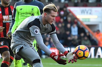 Liverpool's German goalkeeper Loris Karius gathers the ball during the English Premier League football match between Bournemouth and Liverpool at the Vitality Stadium in Bournemouth, southern England on December 4, 2016.
Bournemouth won the game 4-3. / AF