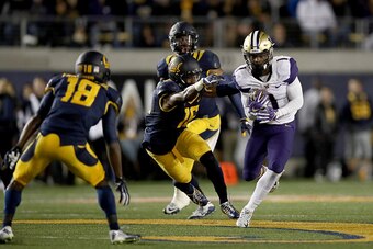 BERKELEY, CA - NOVEMBER 05:  John Ross #1 of the Washington Huskies runs with the ball after making a catch against the California Golden Bears at California Memorial Stadium on November 5, 2016 in Berkeley, California.  (Photo by Ezra Shaw/Getty Images)