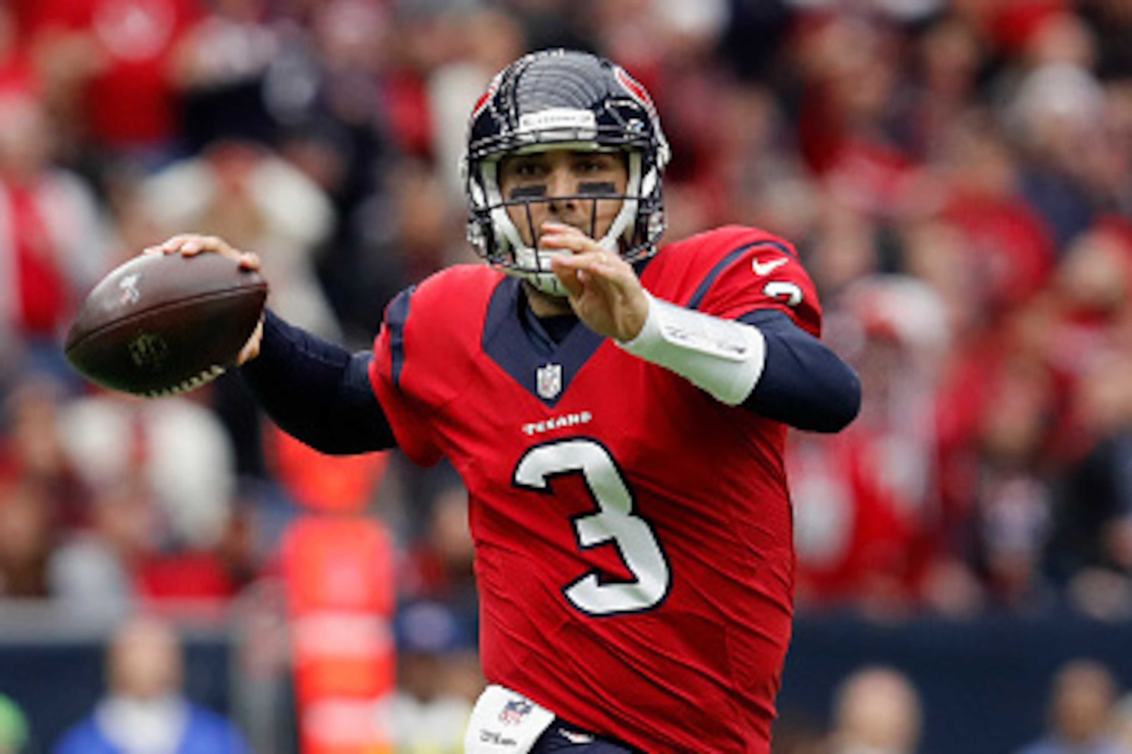 HOUSTON, TX - DECEMBER 18: Tom Savage #3 of the Houston Texans rolls out to pass in the third quarter against the Jacksonville Jaguars at NRG Stadium on December 18, 2016 in Houston, Texas. (Photo by Tim Warner/Getty Images)
