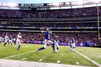EAST RUTHERFORD, NJ - DECEMBER 18:   Odell Beckham #13 of the New York Giants returns a punt for a touchdown against the Detroit Lions which was called back on a holding penalty during their game at MetLife Stadium on December 18, 2016 in East Rutherford,