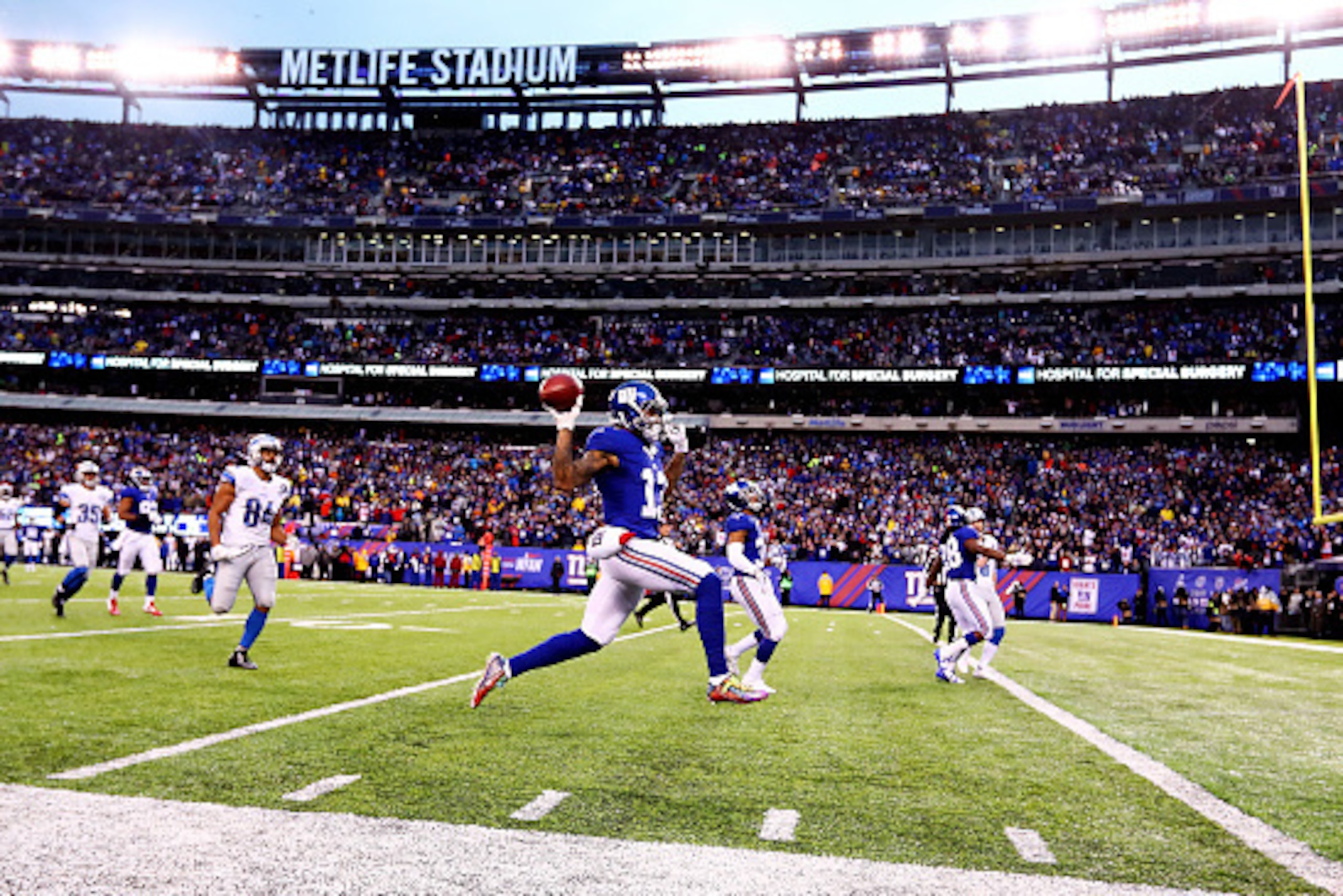 EAST RUTHERFORD, NJ - DECEMBER 18:   Odell Beckham #13 of the New York Giants returns a punt for a touchdown against the Detroit Lions which was called back on a holding penalty during their game at MetLife Stadium on December 18, 2016 in East Rutherford,
