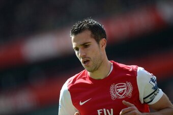 Arsenal's Dutch striker Robin Van Persie looks on during the English Premier League football match between Arsenal and Chelsea at The Emirates Stadium in north London, England on April 21, 2012. AFP PHOTO/ADRIAN DENNIS

RESTRICTED TO EDITORIAL USE. No use