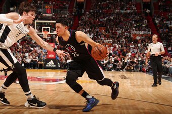 MIAMI, FL - DECEMBER 16:  Austin Rivers #25 of the LA Clippers drives to the basket during a game against the Miami Heat on December 16, 2016 at American Airlines Arena in Miami, Florida. NOTE TO USER: User expressly acknowledges and agrees that, by downl