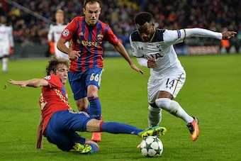 MOSCOW, RUSSIA - SEPTEMBER 27: Mario Fernandes and Bibras Natcho (C) of CSKA Moscow vies for the ball with Georges-Kvin N'Koudou of Tottenham Hotspur FC during the UEFA Champions League match between PFC CSKA Moskva and Tottenham Hotspur FC at    the CSKA