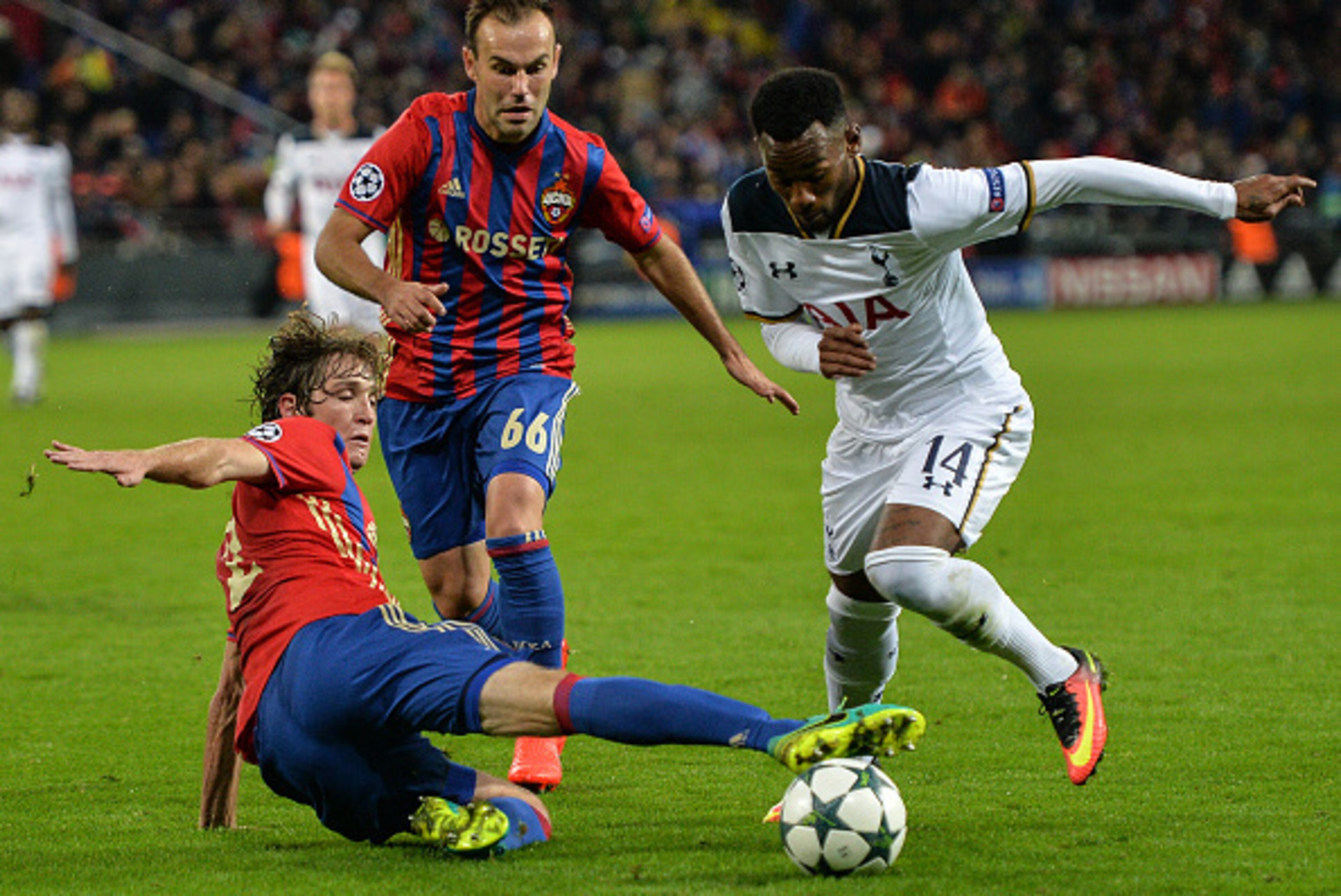 MOSCOW, RUSSIA - SEPTEMBER 27: Mario Fernandes and Bibras Natcho (C) of CSKA Moscow vies for the ball with Georges-Kvin N'Koudou of Tottenham Hotspur FC during the UEFA Champions League match between PFC CSKA Moskva and Tottenham Hotspur FC at the CSKA MOSCOW, RUSSIA - SEPTEMBER 27: Mario Fernandes and Bibras Natcho (C) of CSKA Moscow vies for the ball with Georges-Kvin N'Koudou of Tottenham Hotspur FC during the UEFA Champions League match between PFC CSKA Moskva and Tottenham Hotspur FC at the CSKA