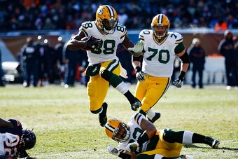 CHICAGO, IL - DECEMBER 18:  Ty Montgomery #88 of the Green Bay Packers jumps over teammate  Richard Rodgers #82 in the second quarter against the Chicago Bears at Soldier Field on December 18, 2016 in Chicago, Illinois.  (Photo by Joe Robbins/Getty Images