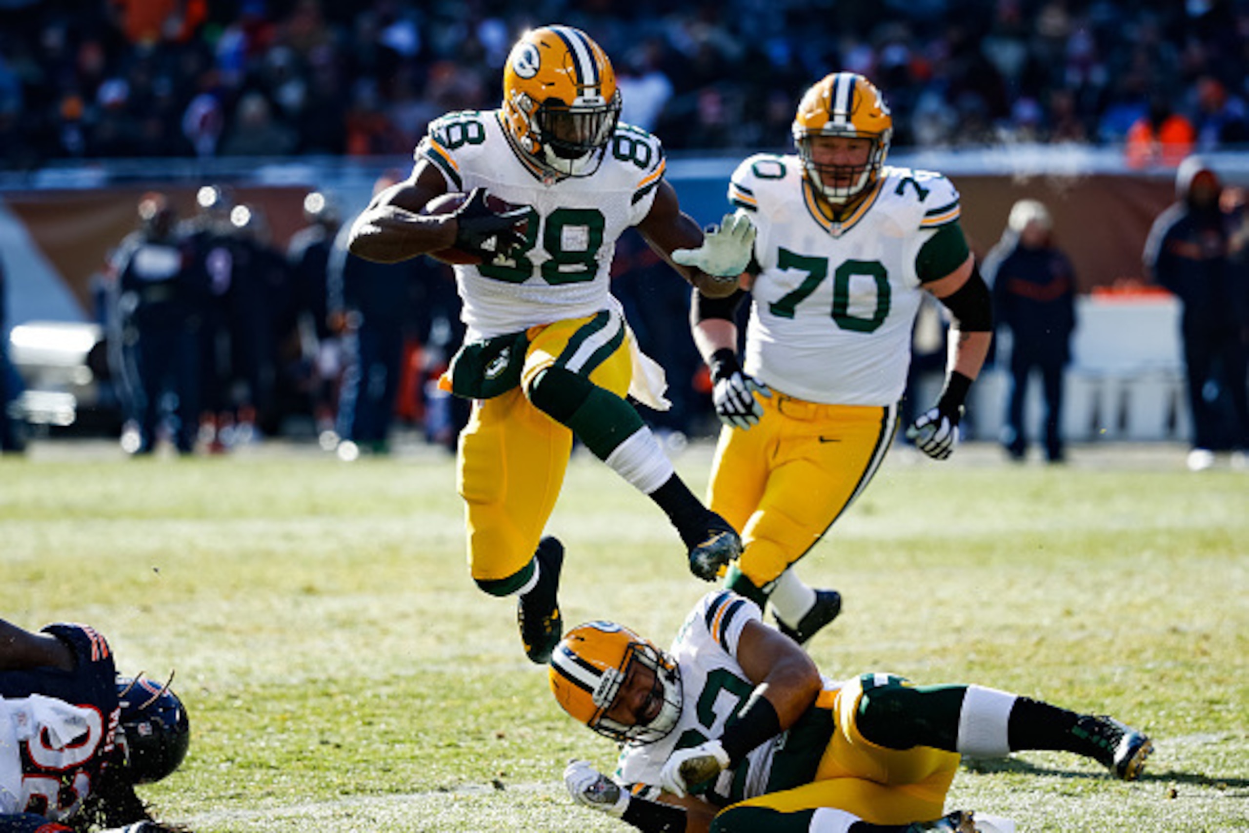 CHICAGO, IL - DECEMBER 18:  Ty Montgomery #88 of the Green Bay Packers jumps over teammate  Richard Rodgers #82 in the second quarter against the Chicago Bears at Soldier Field on December 18, 2016 in Chicago, Illinois.  (Photo by Joe Robbins/Getty Images