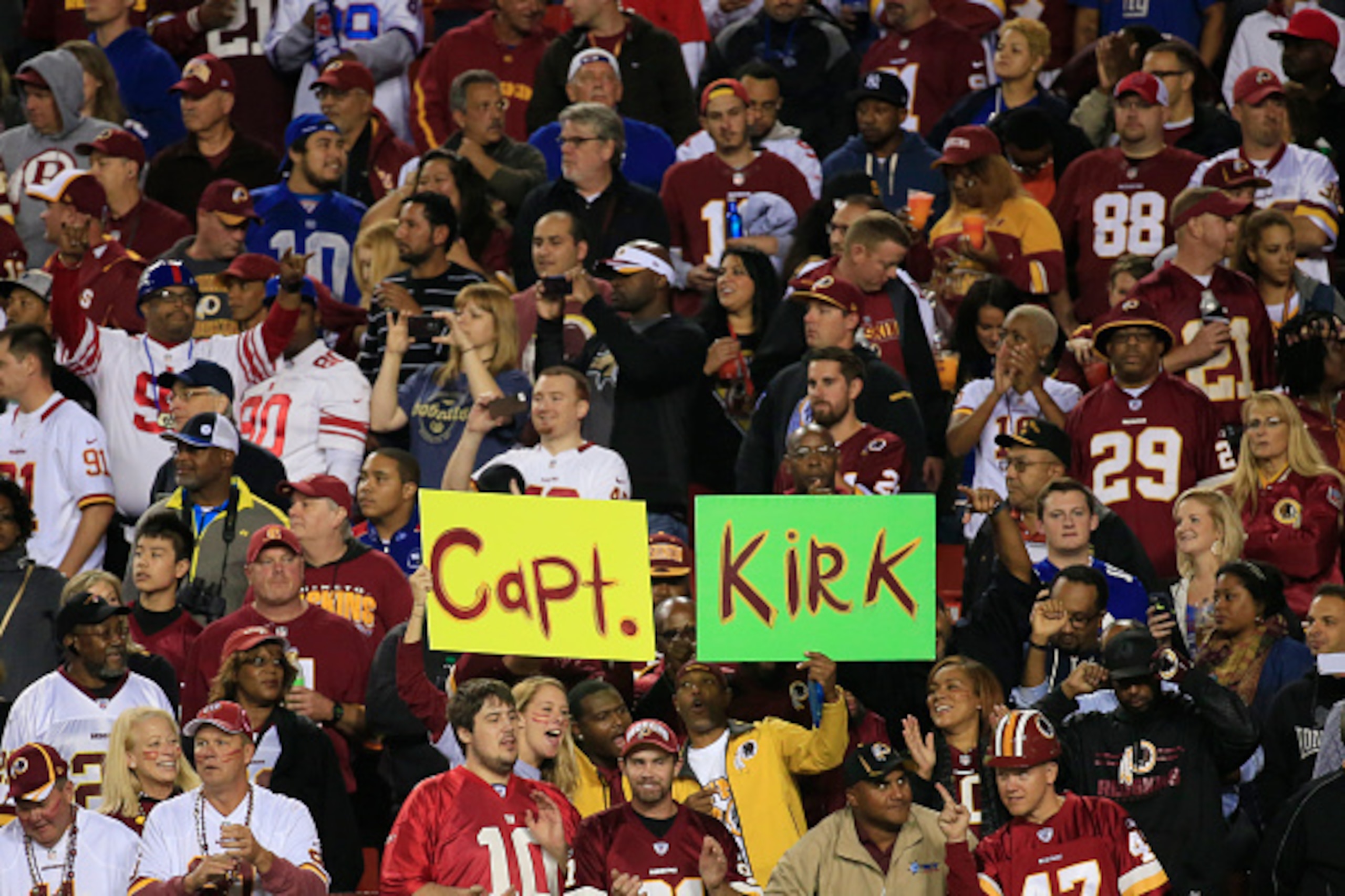 LANDOVER, MD - SEPTEMBER 25: Washington Redskins fans hold up a sign refering to quarterback Kirk Cousins during a game against the New York Giants at FedExField on September 25, 2014 in Landover, Maryland. (Photo by Rob Carr/Getty Images)