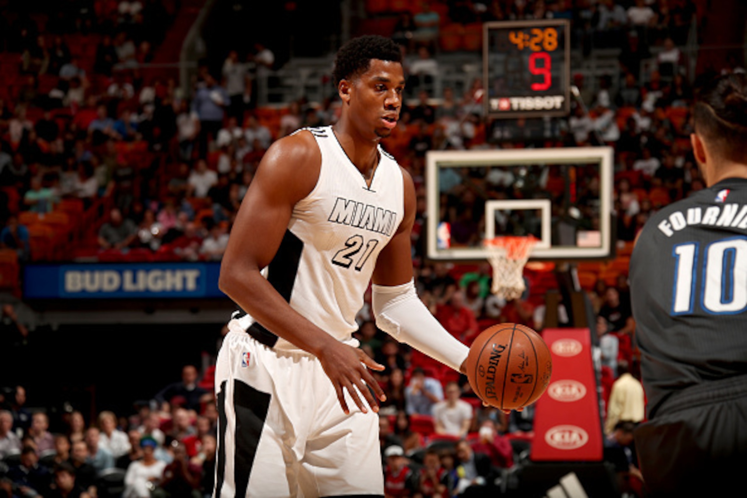 MIAMI, FL - DECEMBER 20:  Hassan Whiteside #21 of the Miami Heat handles the ball against the Orlando Magic on December 20, 2016 at American Airlines Arena in Miami, Florida. NOTE TO USER: User expressly acknowledges and agrees that, by downloading and or
