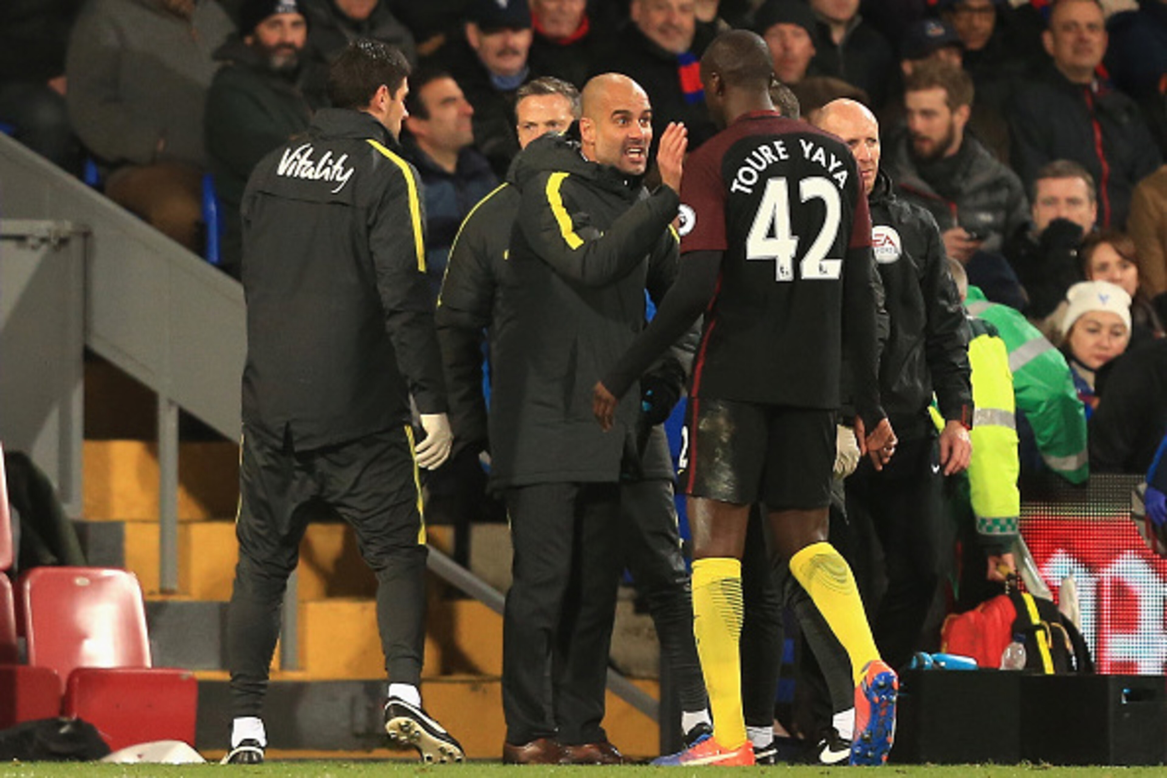 LONDON, ENGLAND - NOVEMBER 19: Yaya Toure of Manchester City (R) celebrates scoring his sides second goal with Josep Guardiola, Manager of Manchester City (L) during the Premier League match between Crystal Palace and Manchester City at Selhurst Park on LONDON, ENGLAND - NOVEMBER 19: Yaya Toure of Manchester City (R) celebrates scoring his sides second goal with Josep Guardiola, Manager of Manchester City (L) during the Premier League match between Crystal Palace and Manchester City at Selhurst Park on