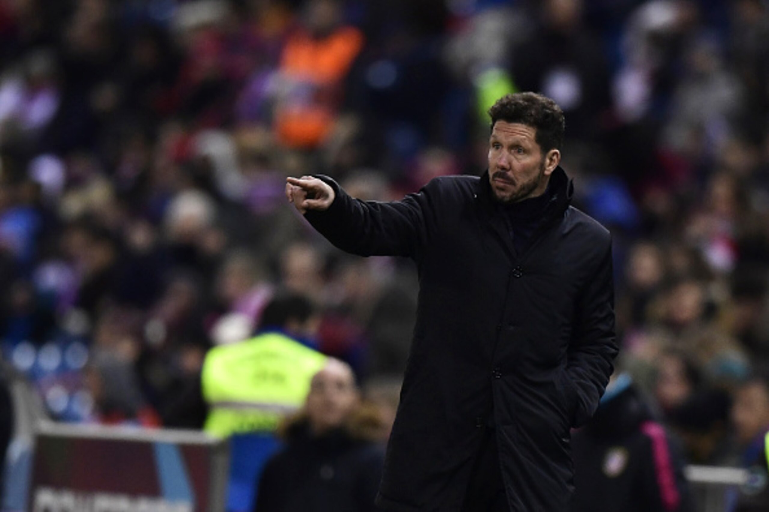 Atletico Madrid's Argentinian coach Diego Simeone gestures during the Spanish Copa del Rey (King's Cup) round of 32 second leg football match Club Atletico de Madrid vs CD Guijuelo at the Vicente Calderon stadium in Madrid on December 20, 2016. / AFP / JA Atletico Madrid's Argentinian coach Diego Simeone gestures during the Spanish Copa del Rey (King's Cup) round of 32 second leg football match Club Atletico de Madrid vs CD Guijuelo at the Vicente Calderon stadium in Madrid on December 20, 2016. / AFP / JA