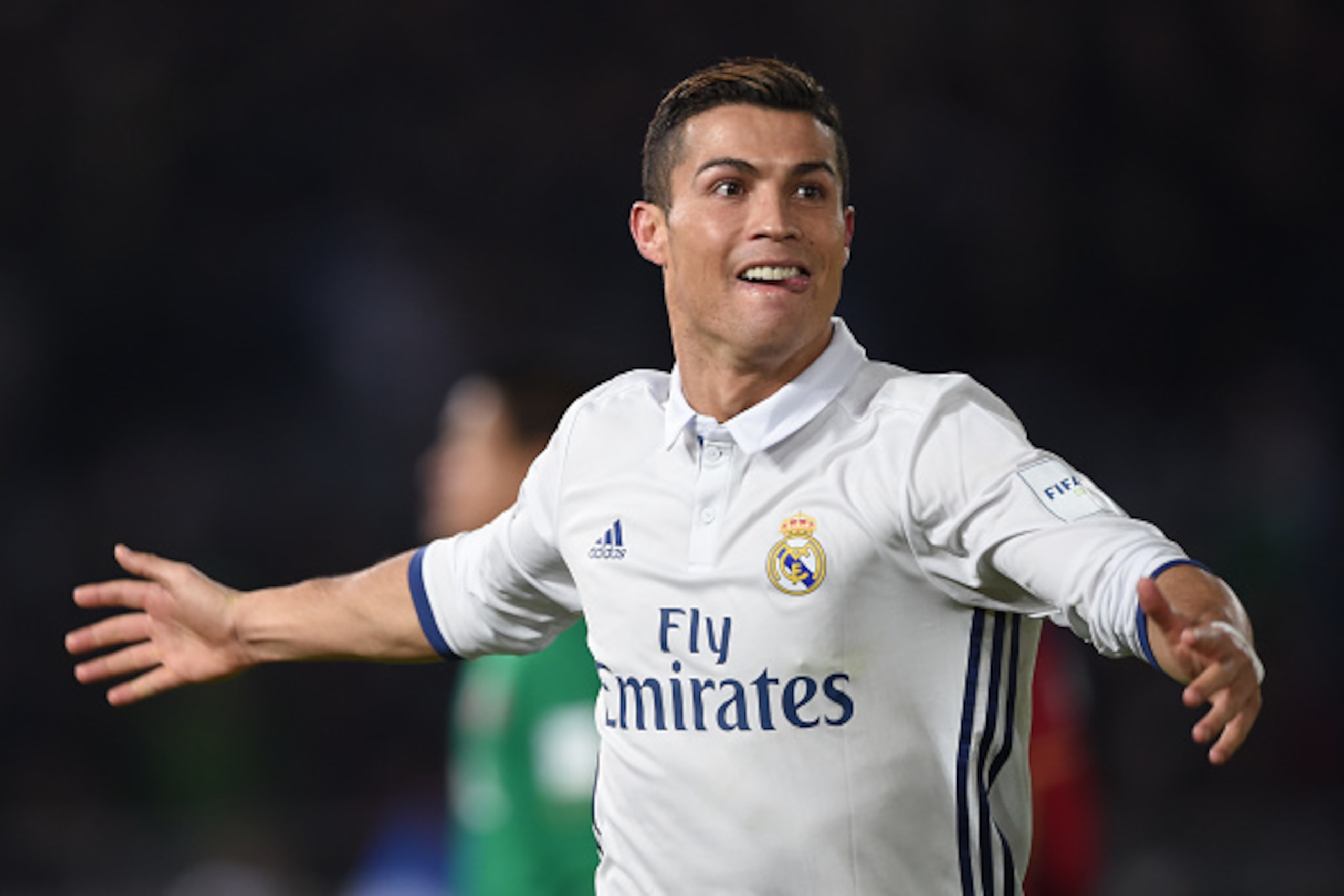 YOKOHAMA, JAPAN - DECEMBER 18: Cristiano Ronaldo of Real Madrid celebrates 4th goal during the FIFA Club World Cup final match between Real Madrid and Kashima Antlers at International Stadium Yokohama on December 18, 2016 in Yokohama, Japan.  (Photo by Ka
