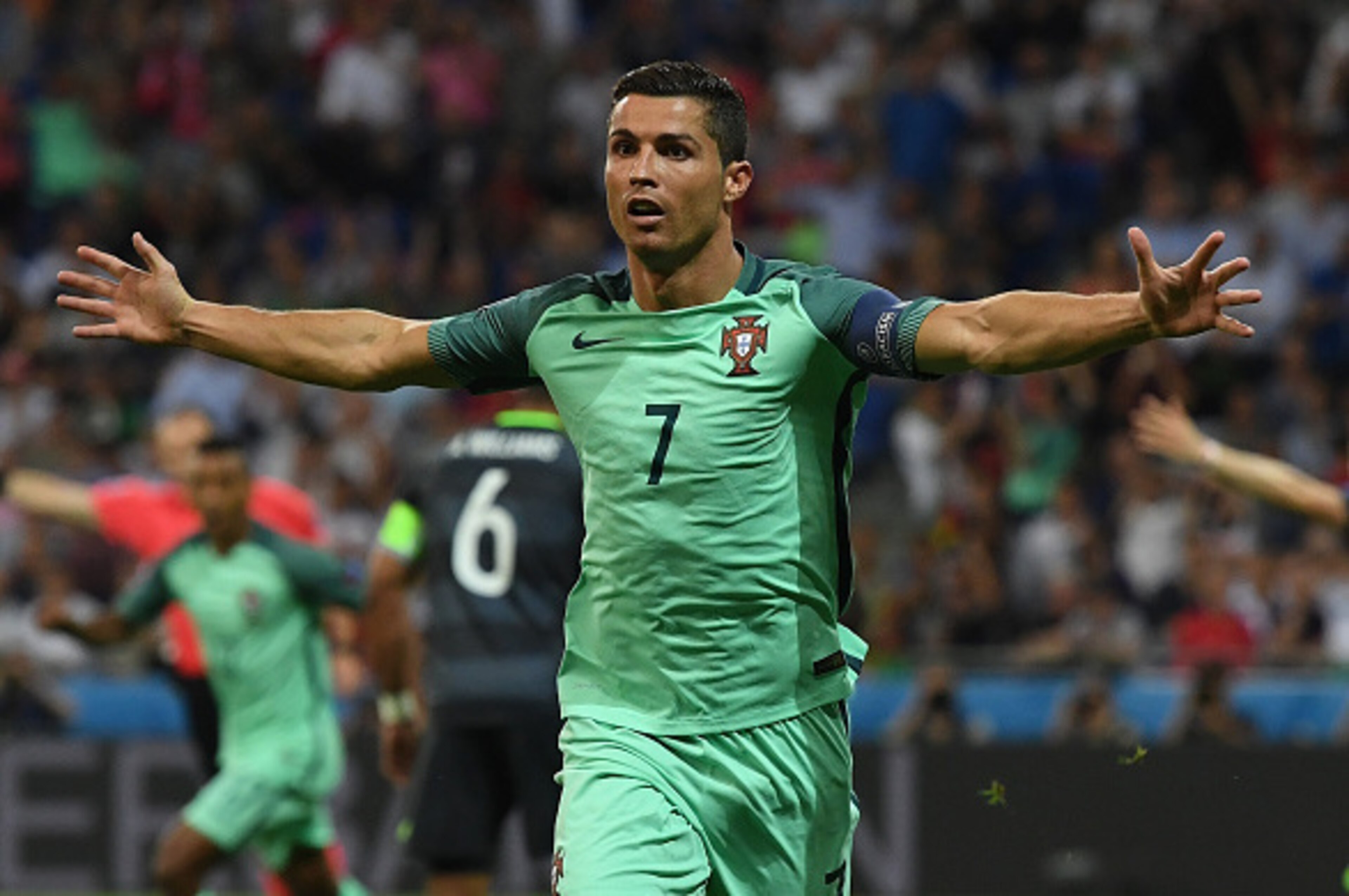 LYON, FRANCE - JULY 06: Cristiano Ronaldo of Portugal celebrates scoring the opening goal during the UEFA EURO 2016 semi final match between Portugal and Wales at Stade des Lumieres on July 6, 2016 in Lyon, France. (Photo by Stu Forster/Getty Images) LYON, FRANCE - JULY 06: Cristiano Ronaldo of Portugal celebrates scoring the opening goal during the UEFA EURO 2016 semi final match between Portugal and Wales at Stade des Lumieres on July 6, 2016 in Lyon, France. (Photo by Stu Forster/Getty Images)