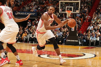 MIAMI, FL - FEBRUARY 9:  Chris Bosh #1 of the Miami Heat drives to the basket against the San Antonio Spurs on February 9, 2016 at American Airlines Arena in Miami, Florida. NOTE TO USER: User expressly acknowledges and agrees that, by downloading and or 