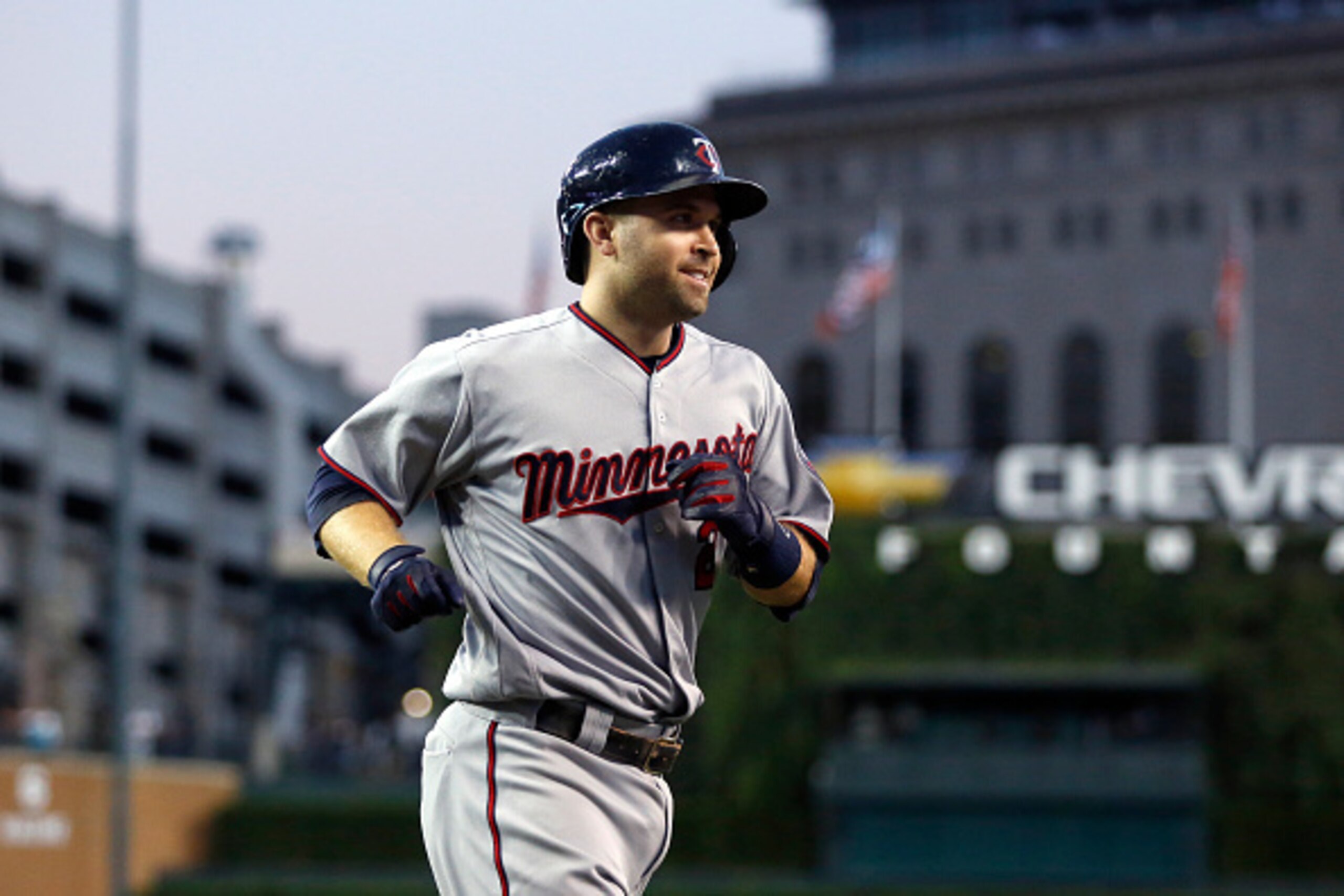 DETROIT, MI - SEPTEMBER 12:  Brian Dozier #2 of the Minnesota Twins smiles as he approaches the dugout after hitting his 40th home run during the third inning at Comerica Park on September 12, 2016 in Detroit, Michigan. (Photo by Duane Burleson/Getty Imag
