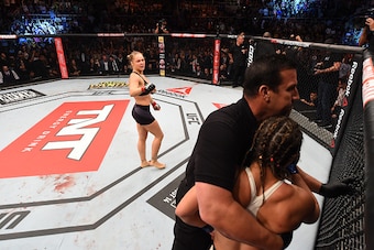 RIO DE JANEIRO, BRAZIL - AUGUST 01:  (L-R) Ronda Rousey of the United States knocks out Bethe Correia of Brazil in the first round in their UFC women's bantamweight championship bout during the UFC 190 event inside HSBC Arena on August 1, 2015 in Rio de J