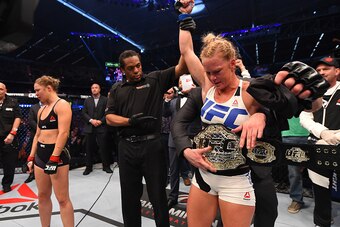 MELBOURNE, AUSTRALIA - NOVEMBER 15:  Holly Holm of the United States celebrates after her knockout victory over Ronda Rousey of the United States in their UFC women's bantamweight championship bout during the UFC 193 event at Etihad Stadium on November 15