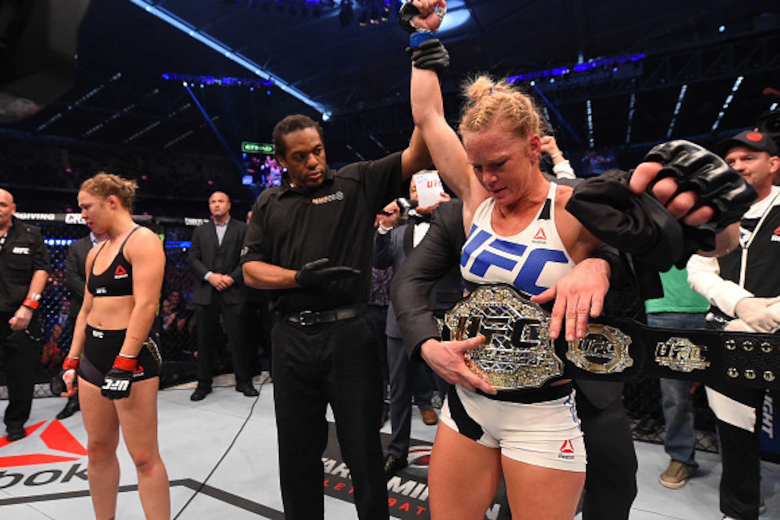 MELBOURNE, AUSTRALIA - NOVEMBER 15:  Holly Holm of the United States celebrates after her knockout victory over Ronda Rousey of the United States in their UFC women's bantamweight championship bout during the UFC 193 event at Etihad Stadium on November 15