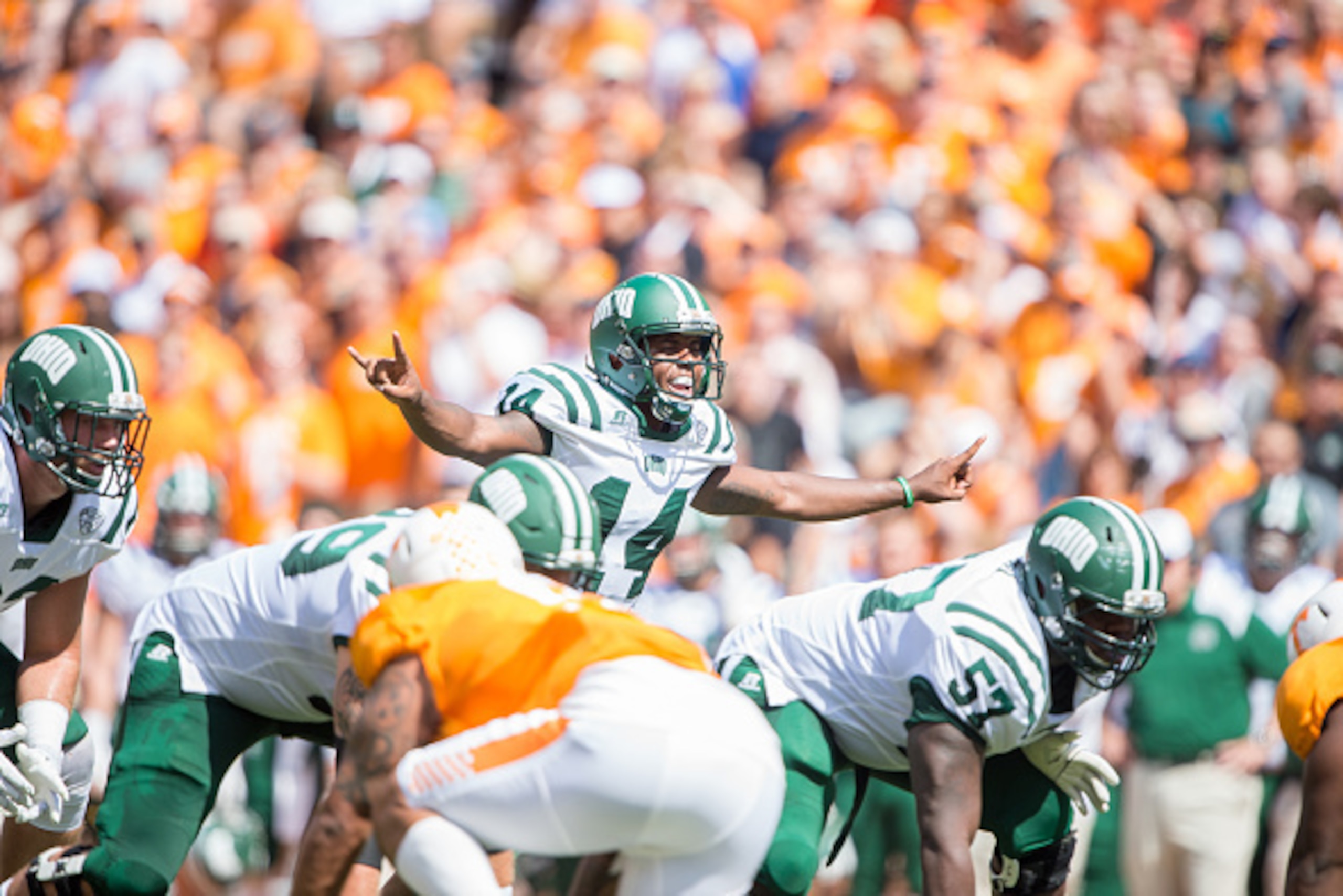 KNOXVILLE, TN - SEPTEMBER 17: Quarterback Greg Windham #14 of the Ohio Bobcats looks to hike the ball during their game against the Tennessee Volunteers at Neyland Stadium on September 17, 2016 in Knoxville, Tennessee.  (Photo by Michael Chang/Getty Image